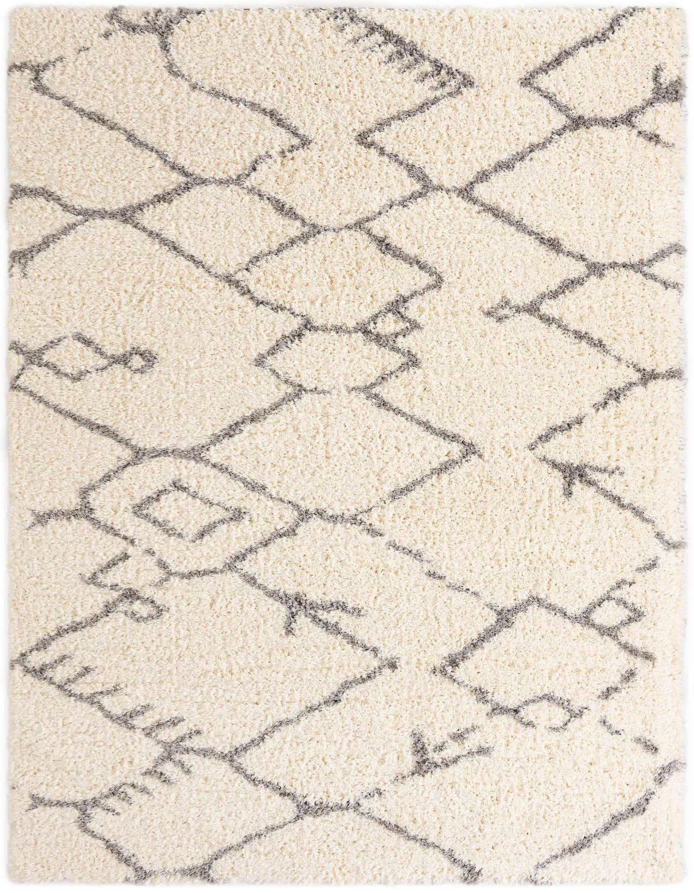 A rectangular 10x14 gray modern shag rug with an abstract geometric pattern, perfect for a living room.