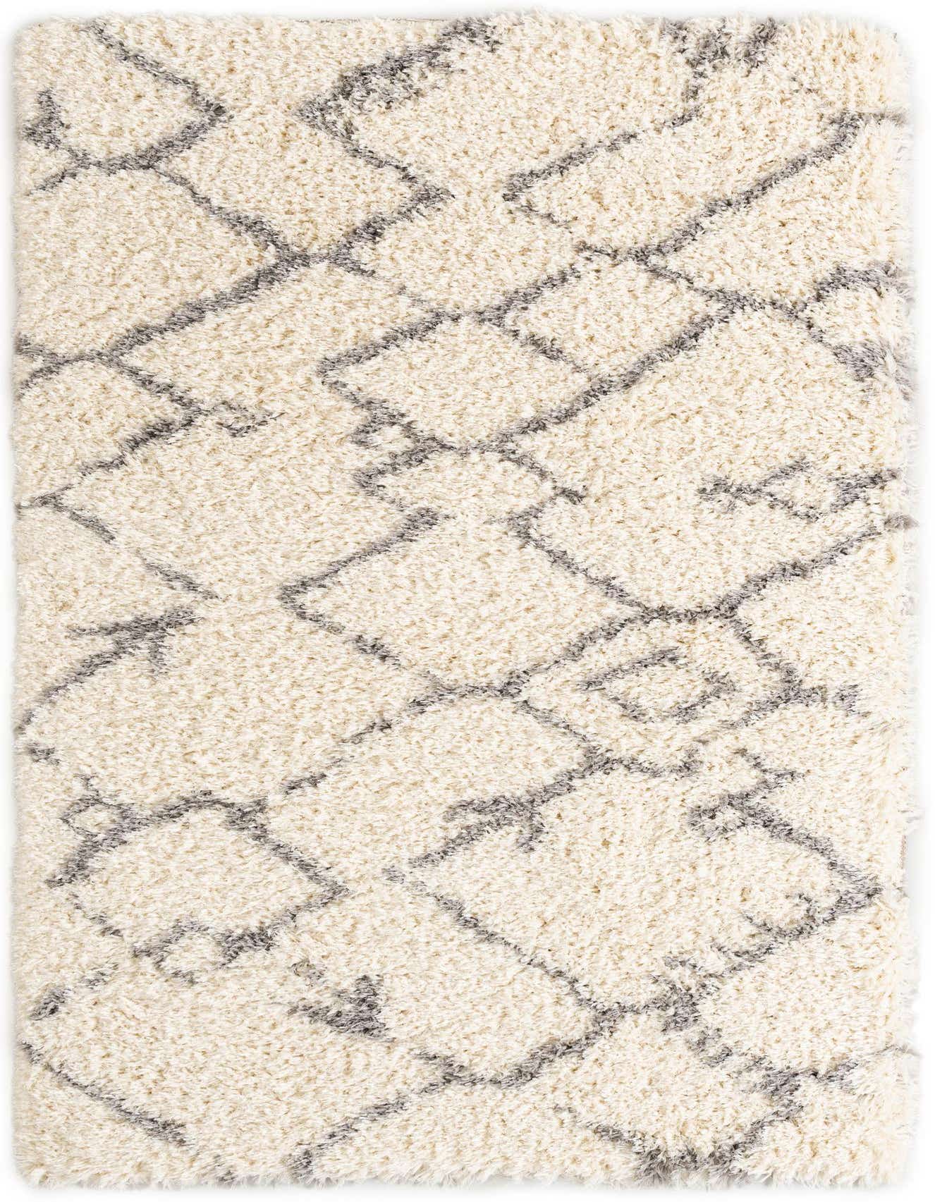 A 5x8 rectangular shag rug with a modern gray geometric pattern on a creamy white background, perfect for a living room.