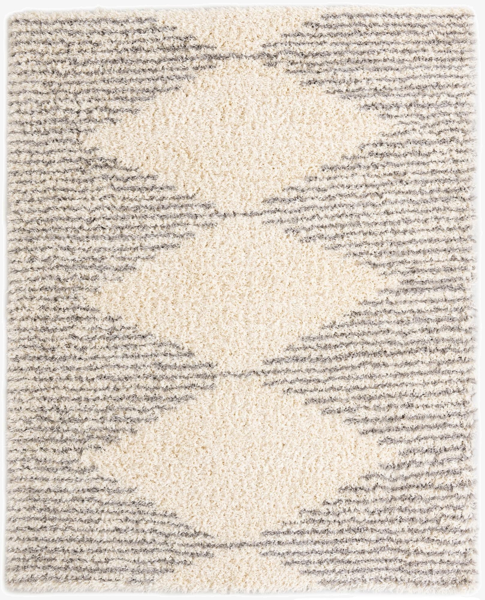 A rectangular 8x10 gray and ivory shag rug featuring a modern diamond pattern, suitable for a living room.