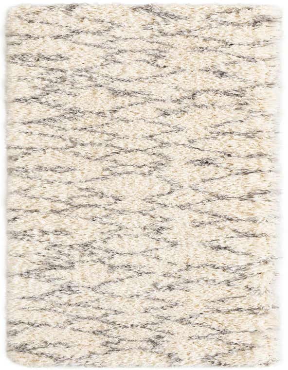 A 10 ft runner rug from the Infinity Shag collection, featuring a modern gray and silver abstract pattern on a plush white shag pile.