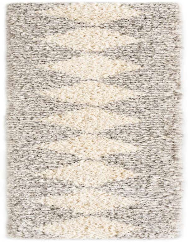 A close-up of a 10 Ft Infinity Shag runner rug featuring a modern gray and ivory diamond pattern.