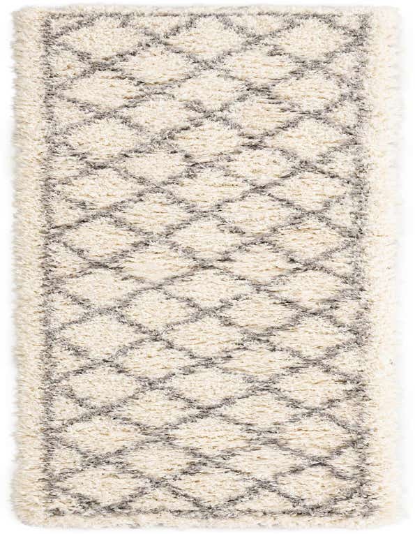 A 10 ft ivory runner rug with a modern geometric diamond pattern in gray, featuring a plush shag pile.