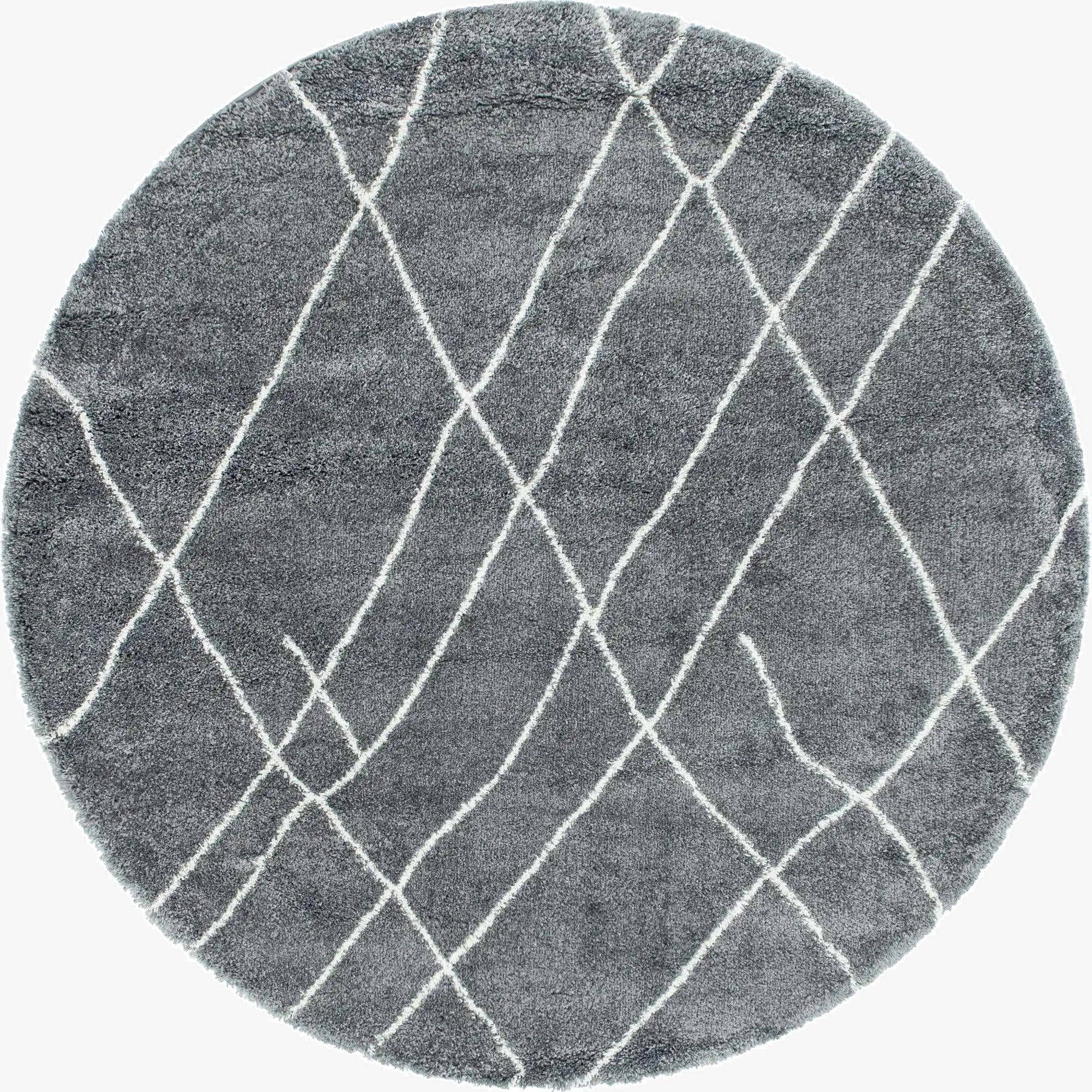 A 7' 10" round gray shag rug with a white diamond trellis pattern, ideal for a modern living space.