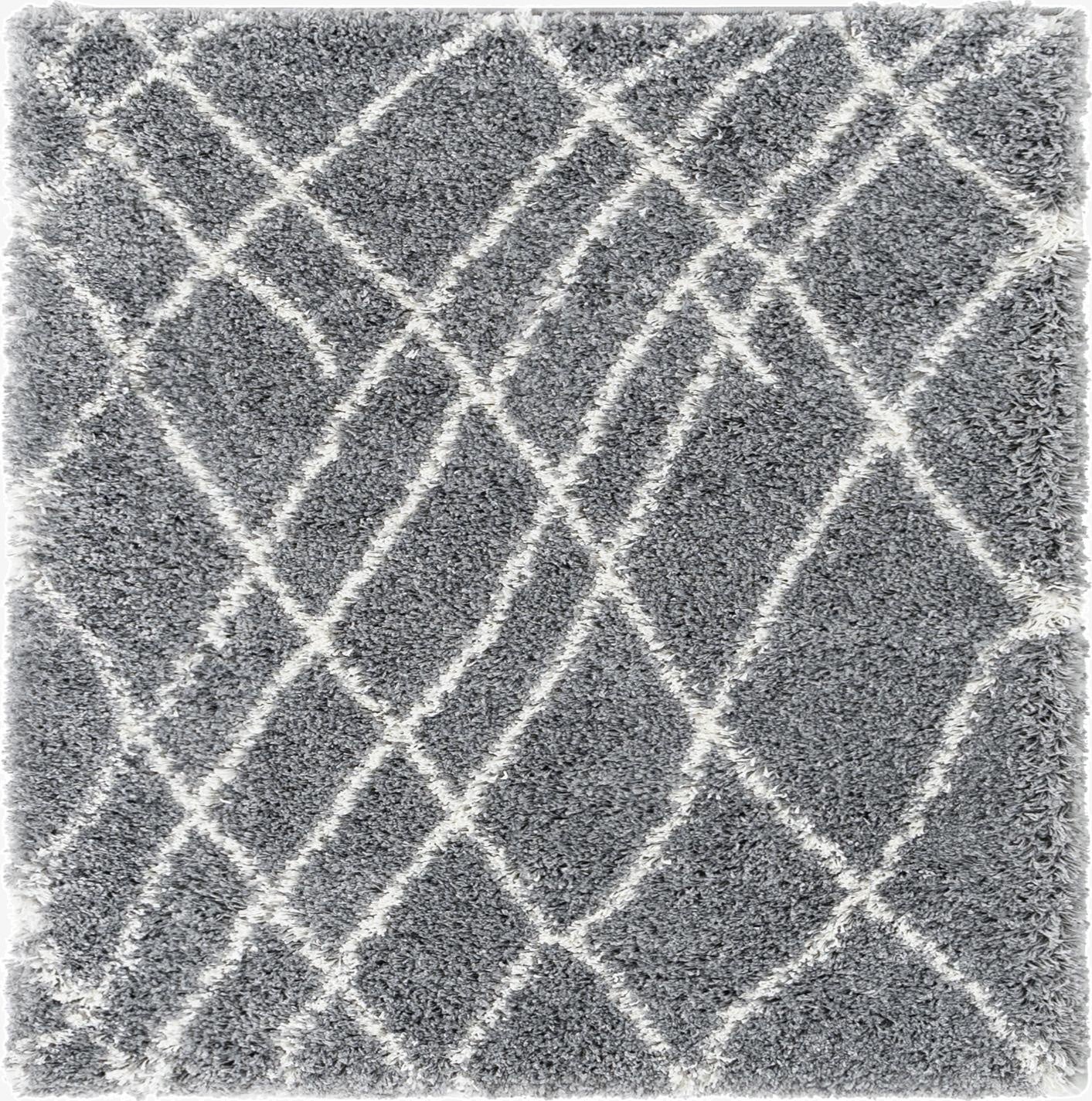 A square gray shag rug with a white diamond trellis pattern, offering a soft, textured feel.