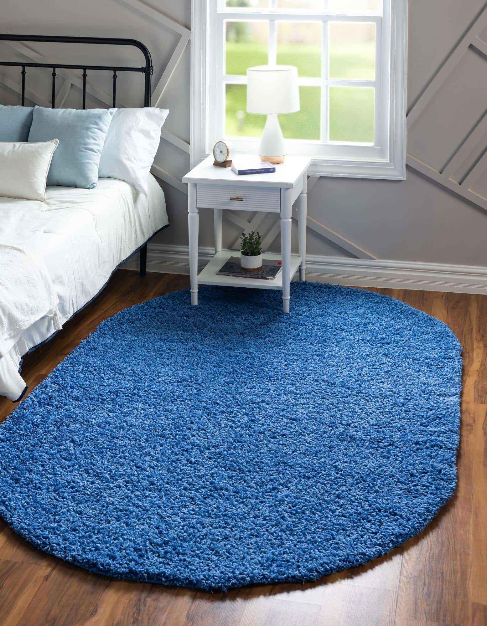 Primary image of  5' 3 x 8' Solid Shag Oval Rug