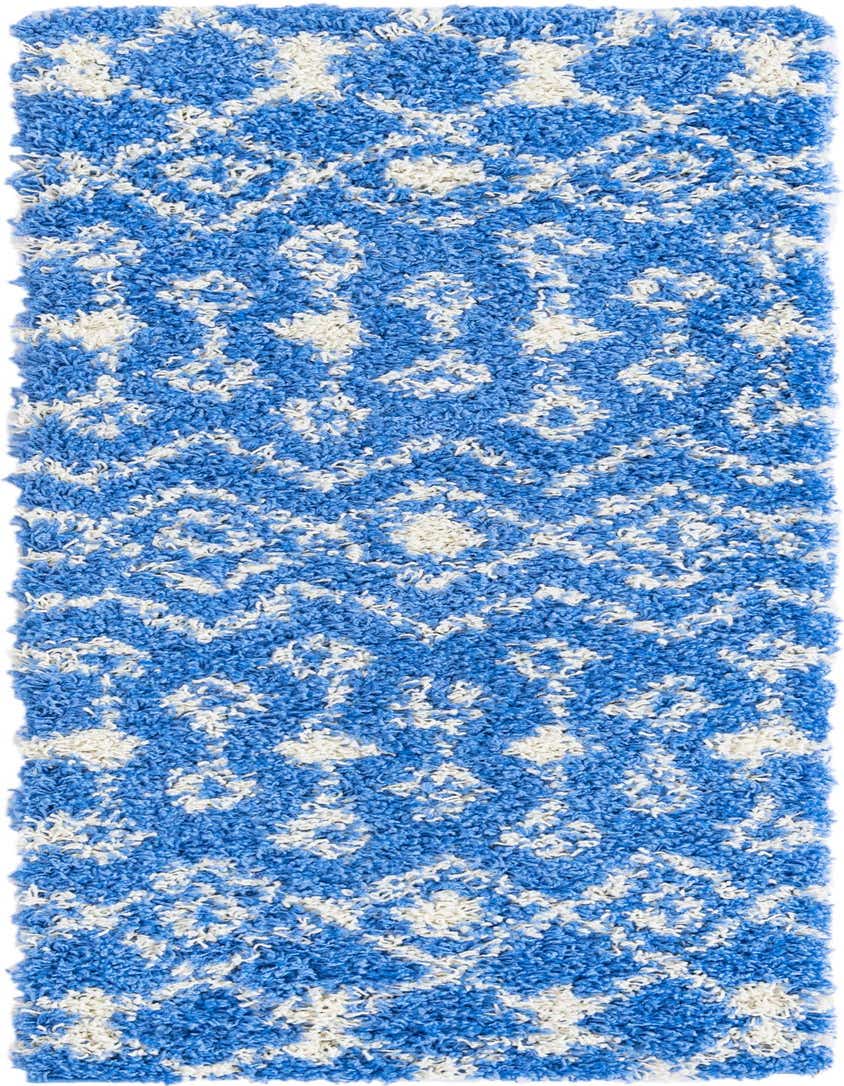 A 5 ft runner rug featuring a plush blue shag pile with a white tribal trellis pattern, ideal for a hallway.