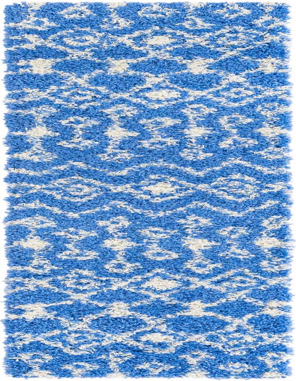 A 7 ft runner rug featuring a plush blue shag pile with a white tribal trellis pattern, ideal for a hallway.
