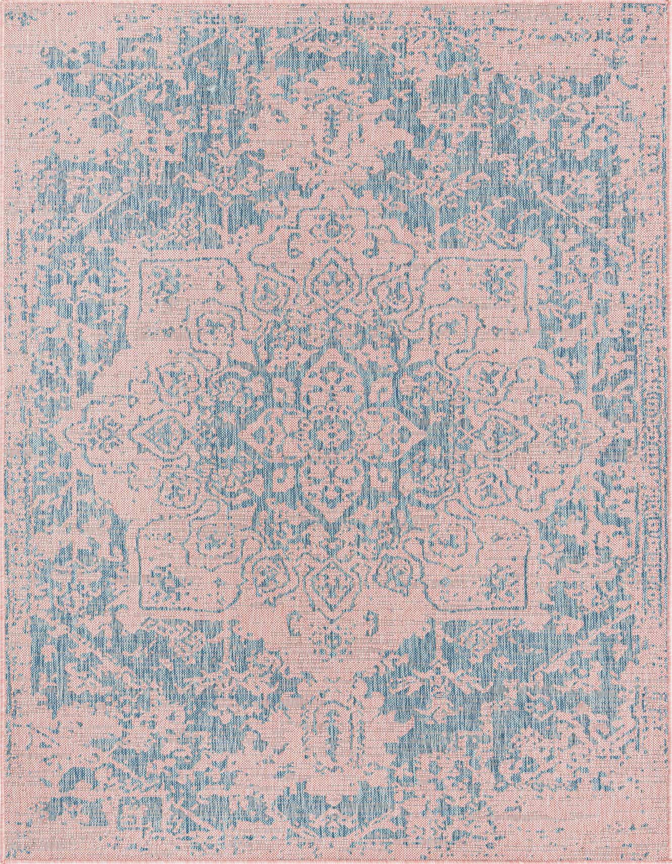 A 5x8 rectangular indoor/outdoor rug featuring a distressed traditional medallion pattern in pink and aqua.