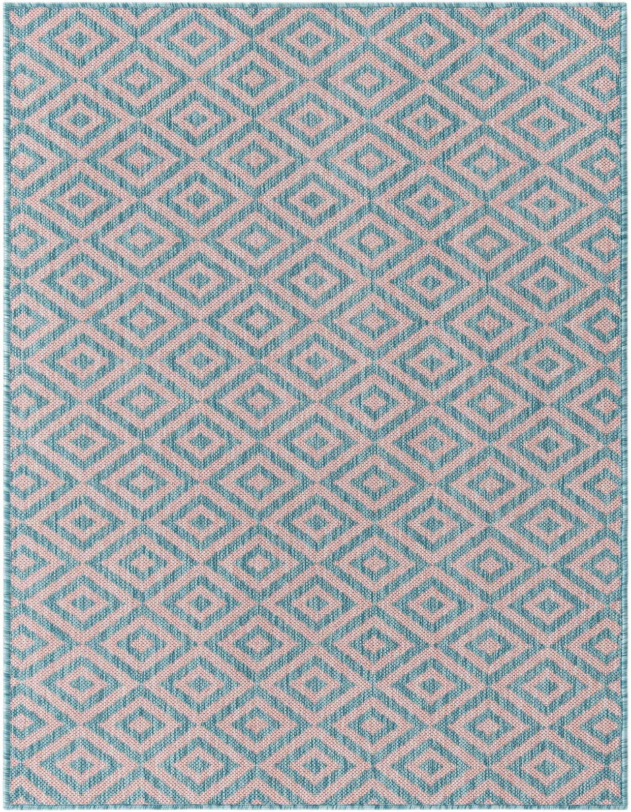 A 3x5 rectangular Jill Zarin Outdoor rug with a pink and aqua geometric trellis pattern, suitable for a patio.