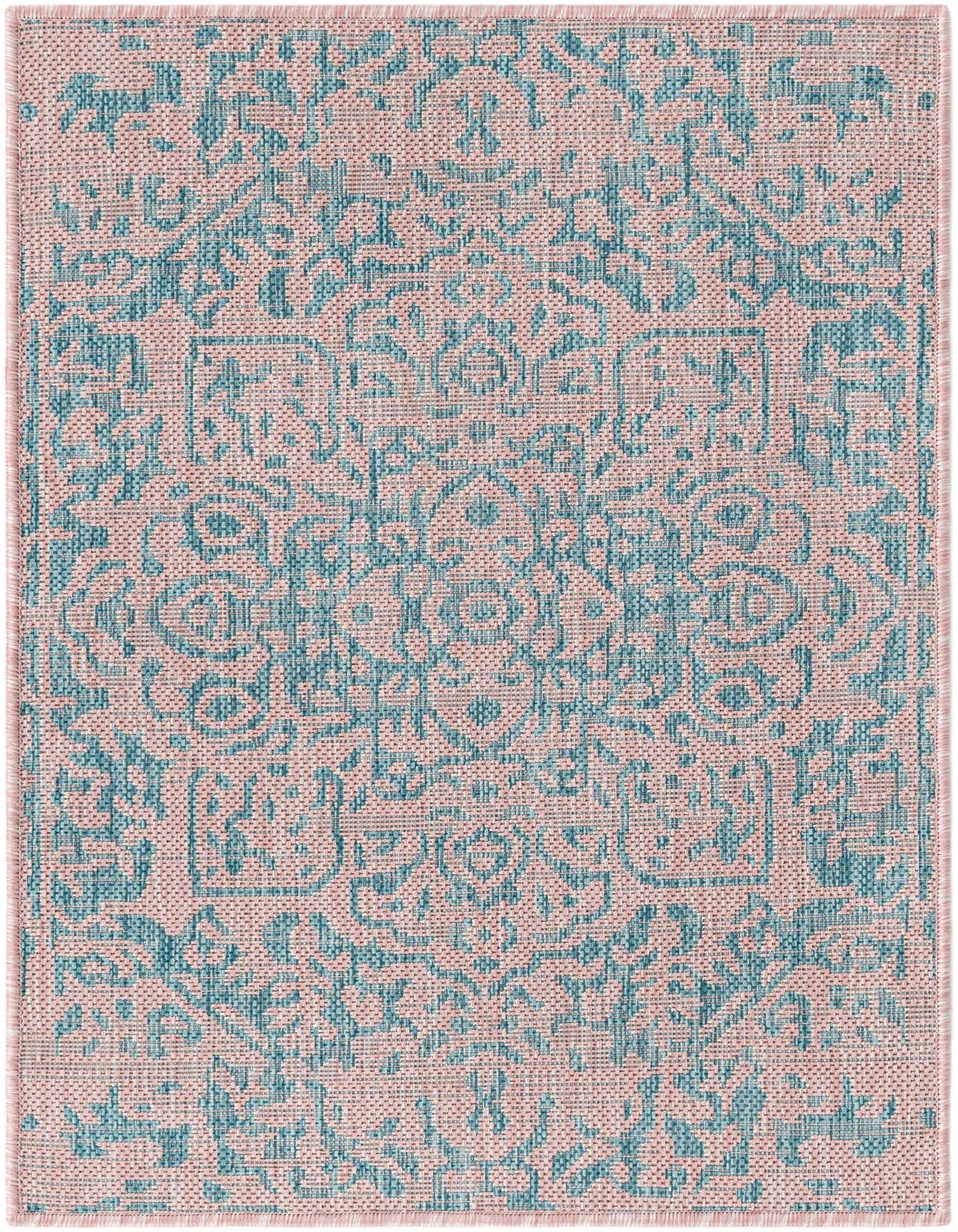 A 2x3 rectangular Jill Zarin Outdoor rug in pink and aqua, featuring a traditional medallion pattern with a flatweave texture.