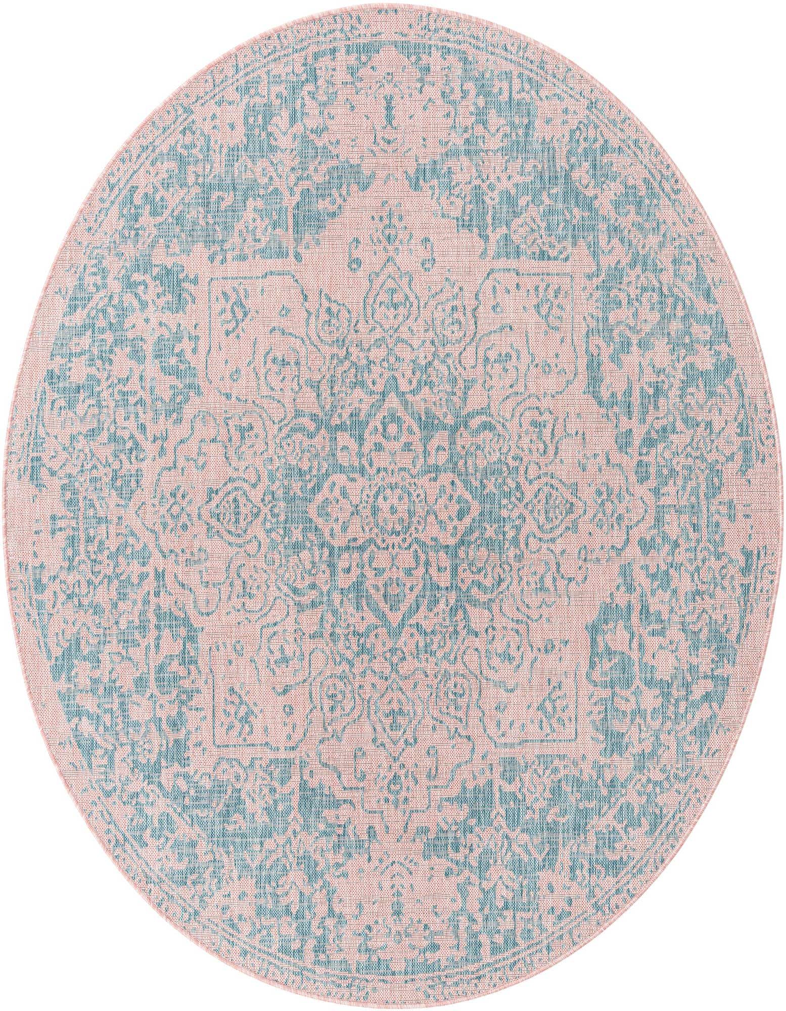 A 7' round Jill Zarin Outdoor rug in pink and aqua, featuring a traditional medallion pattern, suitable for indoor or outdoor use.