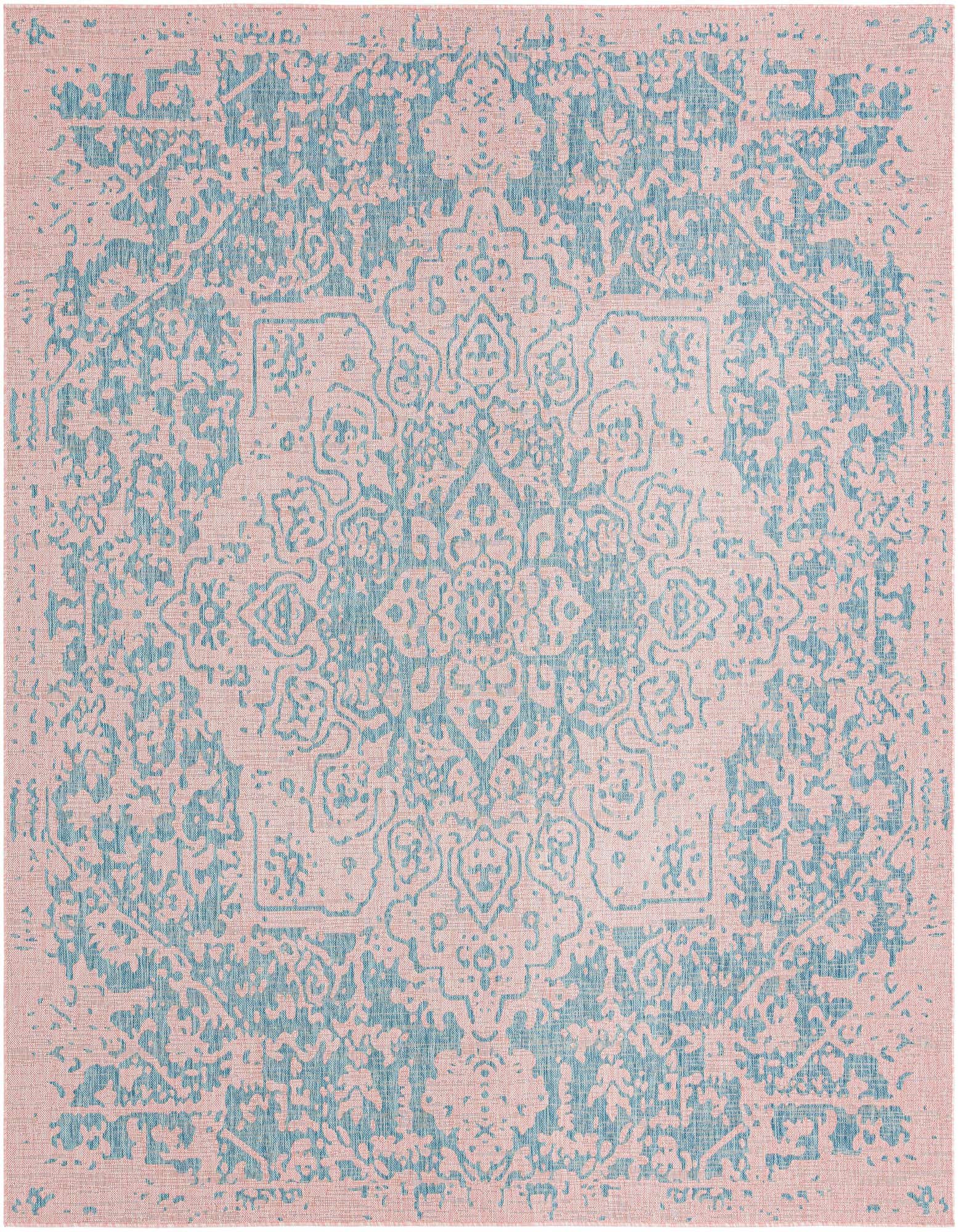 A 10' 8 x 10' 8 square Jill Zarin Outdoor rug featuring a distressed pink and aqua medallion pattern, suitable for indoor or outdoor use.