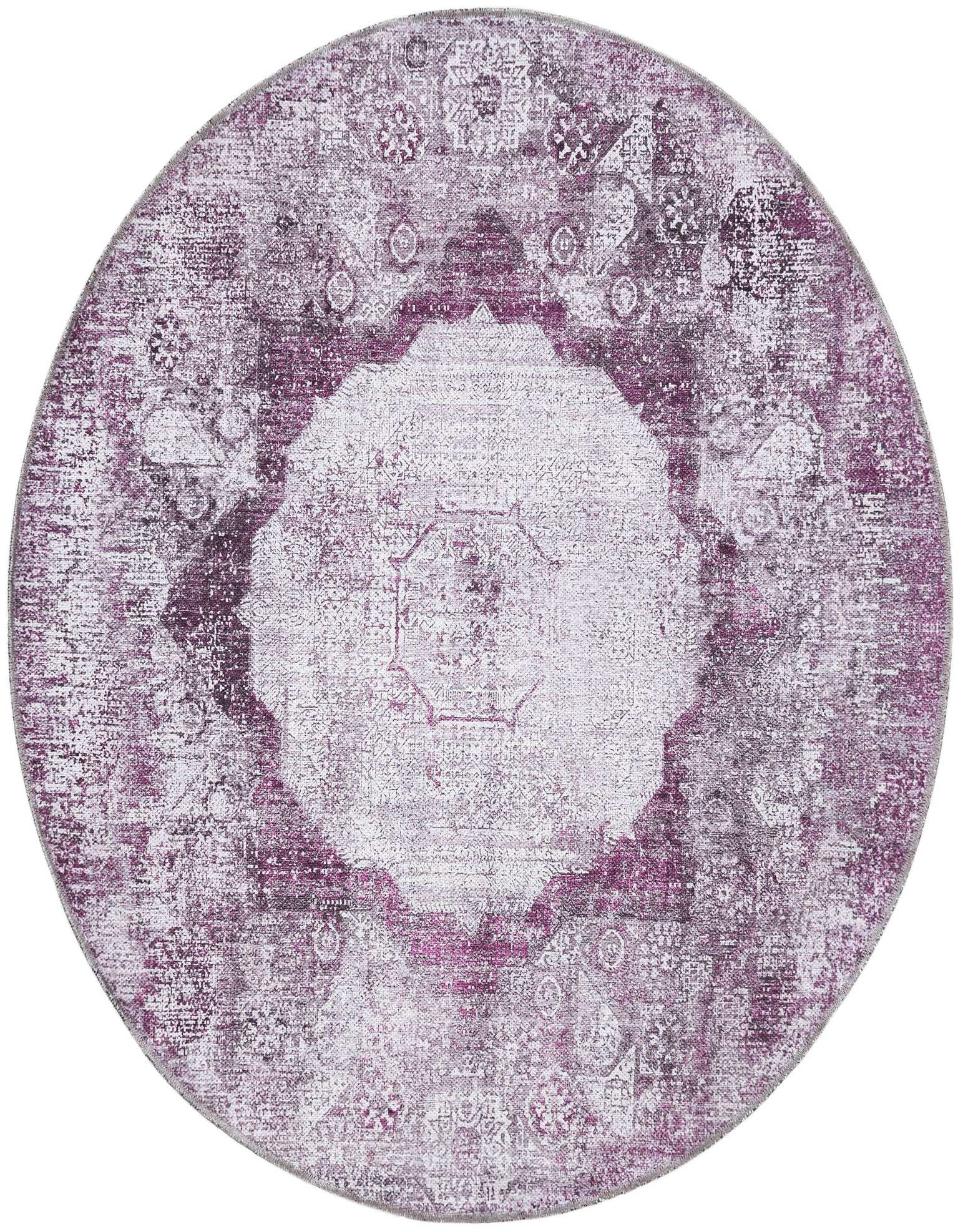 A 4' round ivory and pink traditional medallion rug with a distressed vintage look.