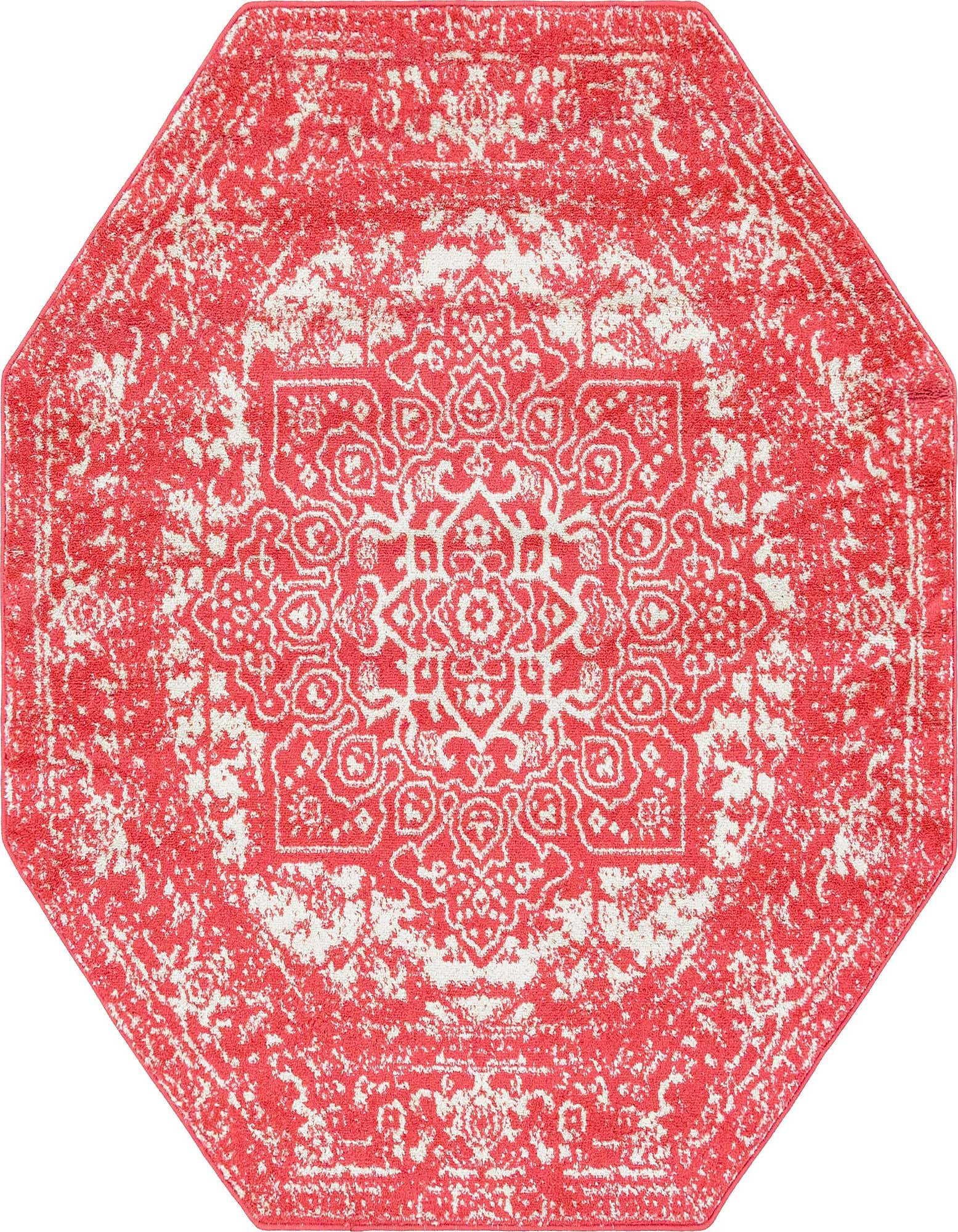 A 5' 3 x 5' 3 octagon pink and white area rug with a distressed traditional medallion pattern.