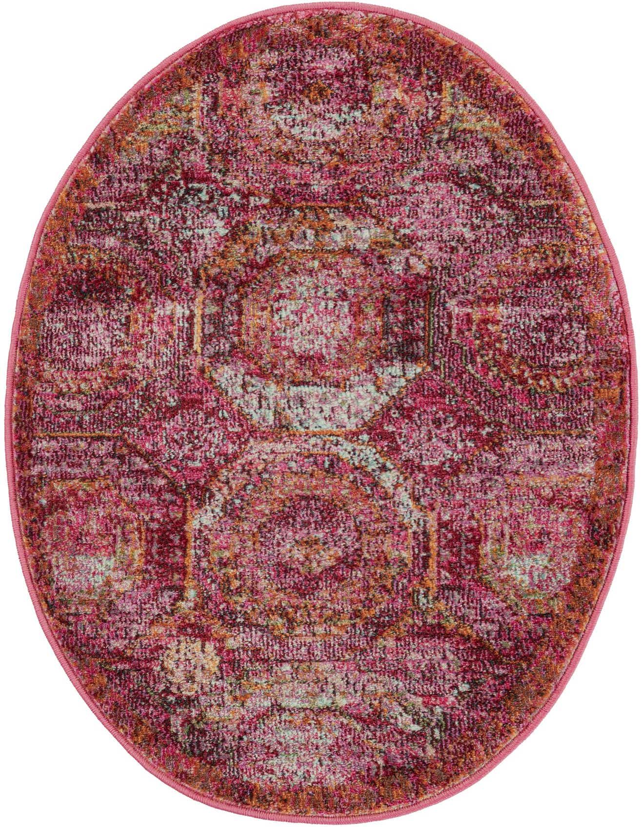 A 2' x 3' oval pink rug with a distressed transitional medallion pattern in shades of pink, yellow, and white.