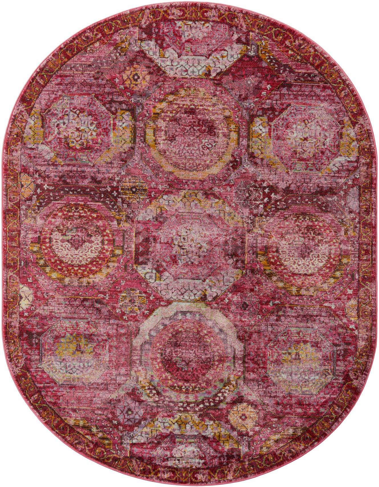 A 5' 5 x 8' 0 oval Santiago rug from Rugs.com, featuring a distressed pink, modern medallion pattern.