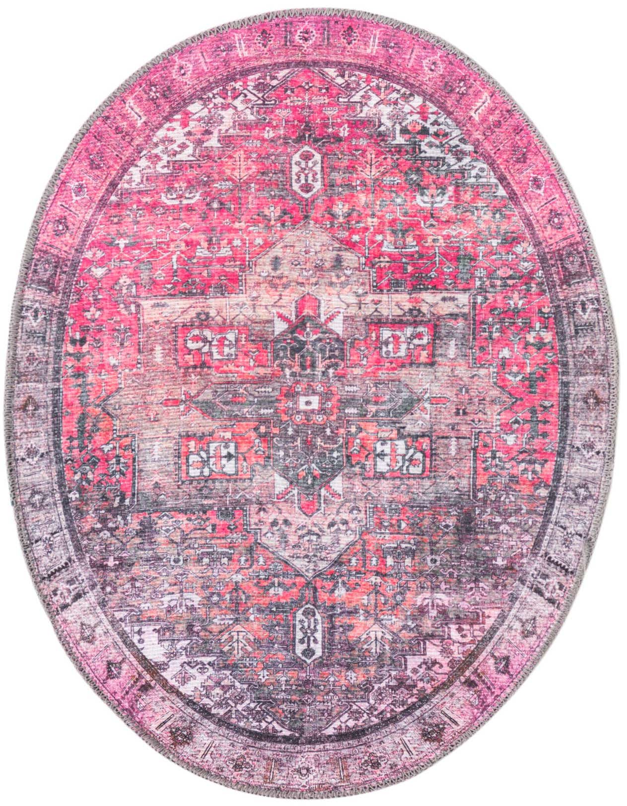 A 2'x3' oval pink transitional rug with a distressed oriental medallion pattern and a flat, textured pile.