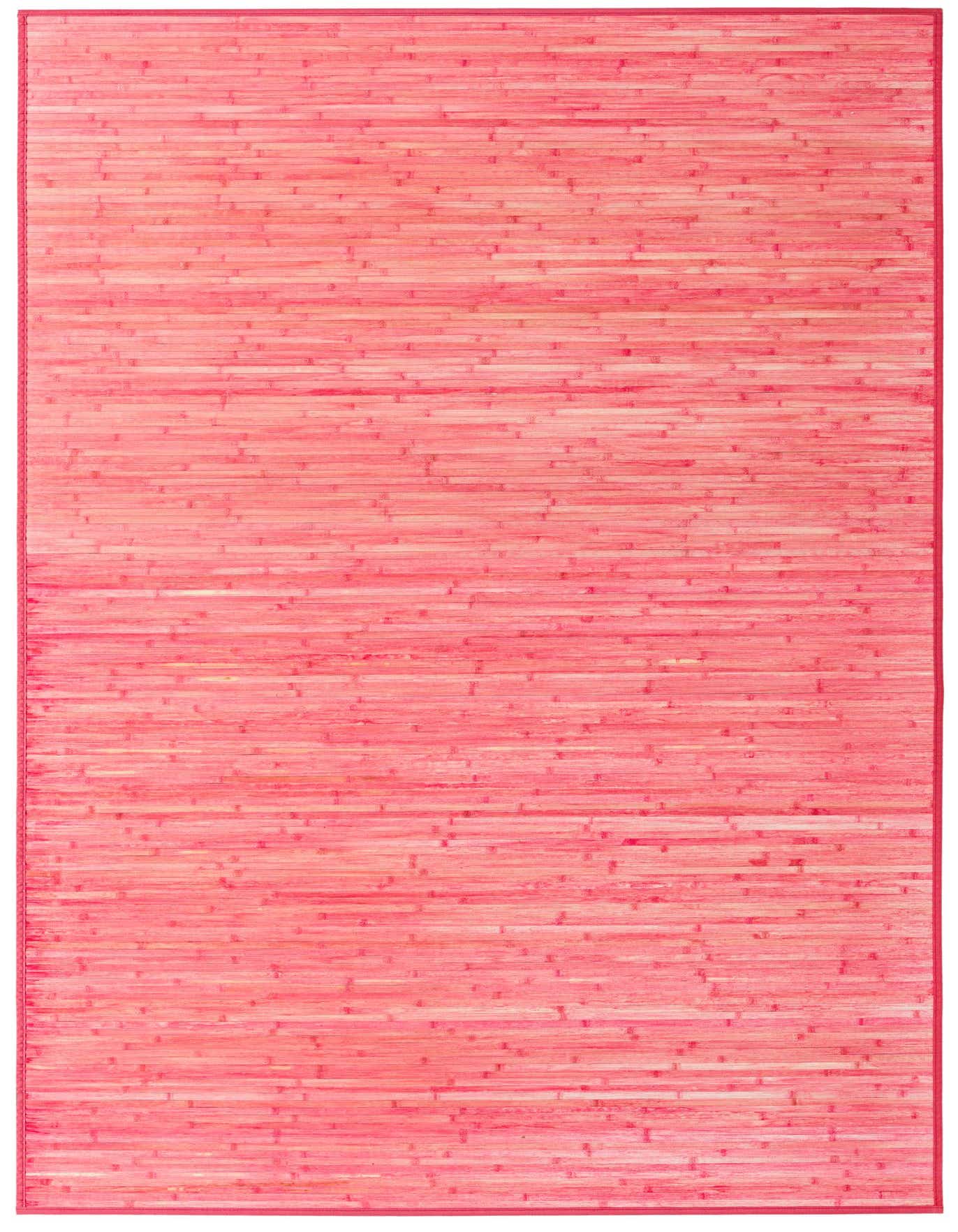 A 6x9 rectangular pink bamboo rug with a French modern solid pattern, ideal for an office or living room.