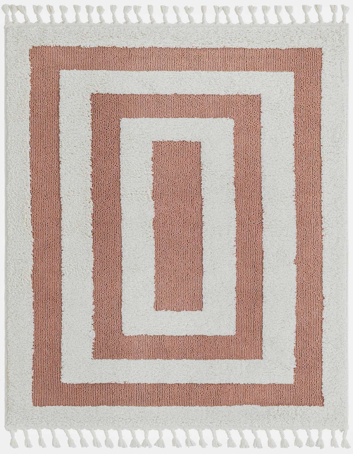 A 4x6 rectangular pink and white modern rug with a bold striped geometric pattern and decorative tassels.
