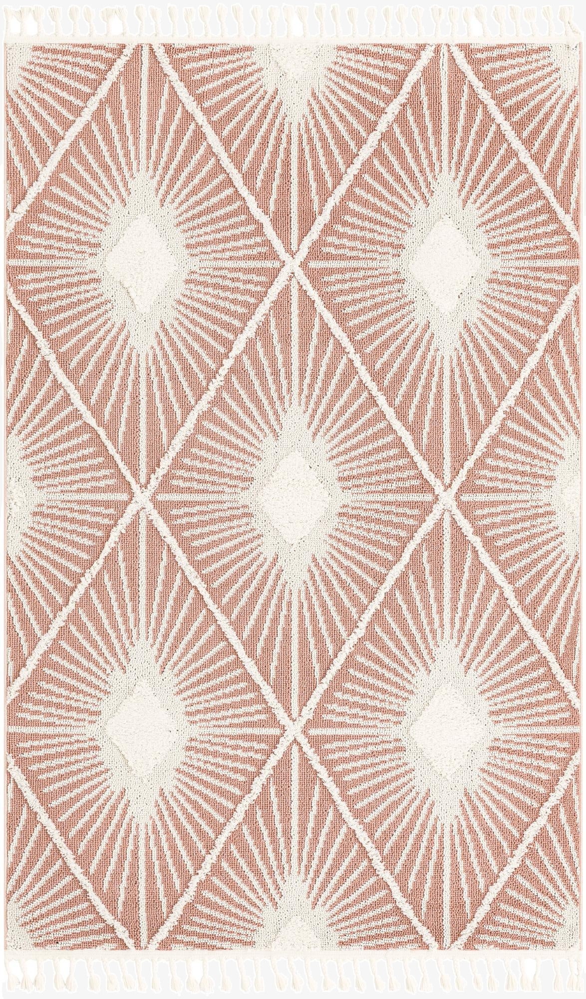 A 5x8 rectangular pink and white bohemian rug with a modern trellis pattern and fringe.