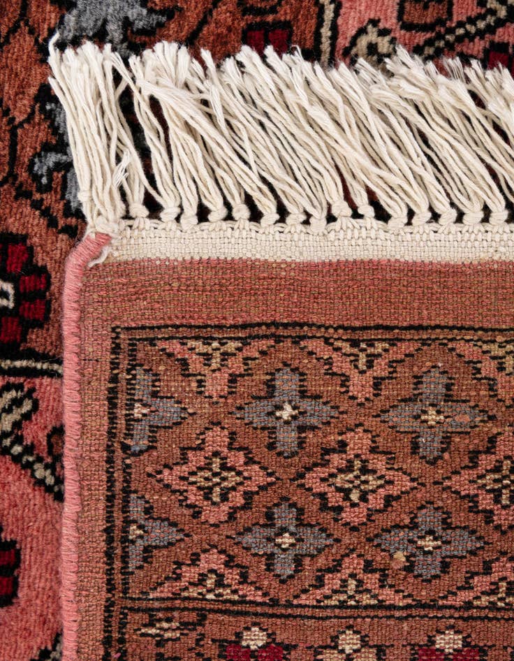 Detail image of  4' 2 x 6' 11  Hand Knotted Bokhara Wool Rug