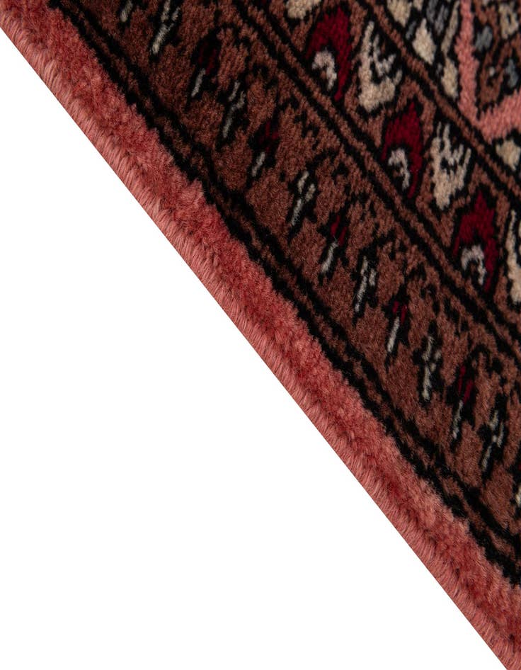 Detail image of  4' 2 x 6' 11  Hand Knotted Bokhara Wool Rug