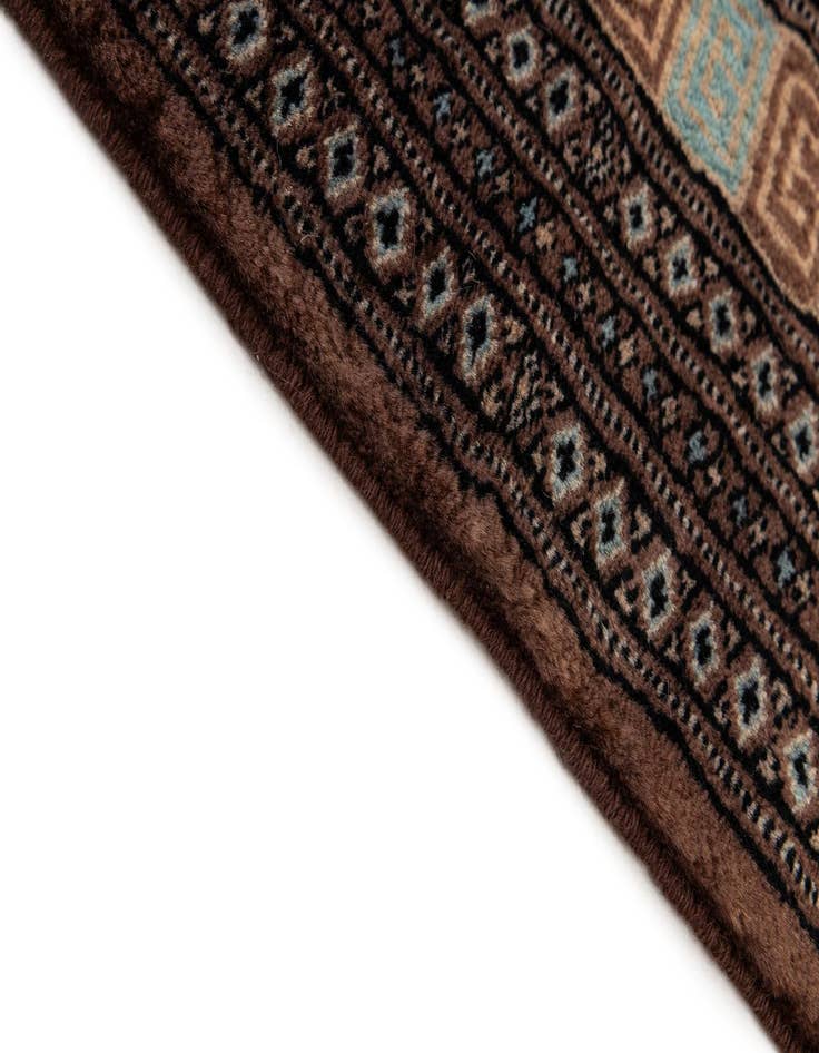 Detail image of  4' 2 x 5' 9  Hand Knotted Bokhara Oriental Wool Rug