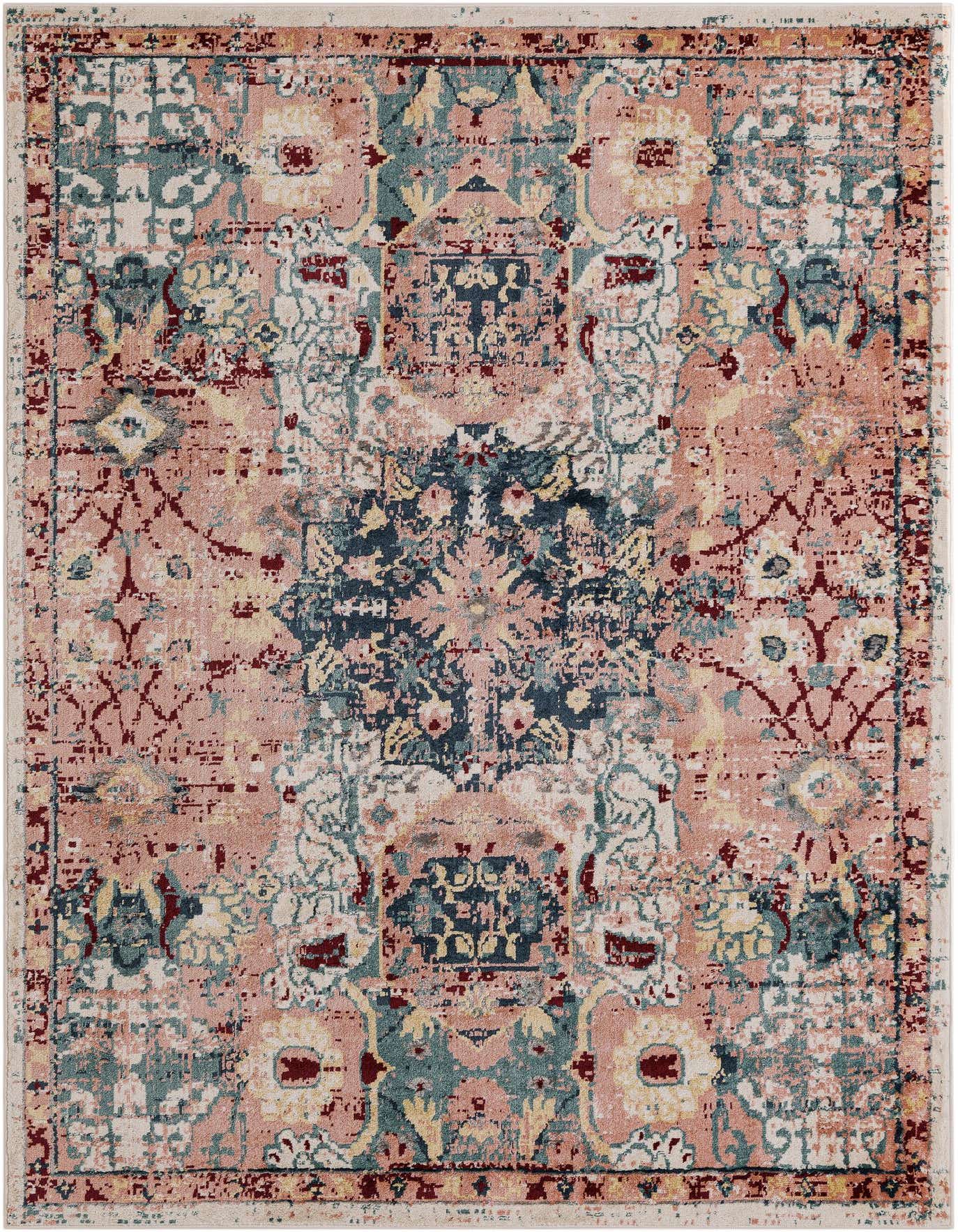 A 7x10 rectangular Charleston rug featuring a distressed vintage medallion pattern in shades of pink, teal, and cream.