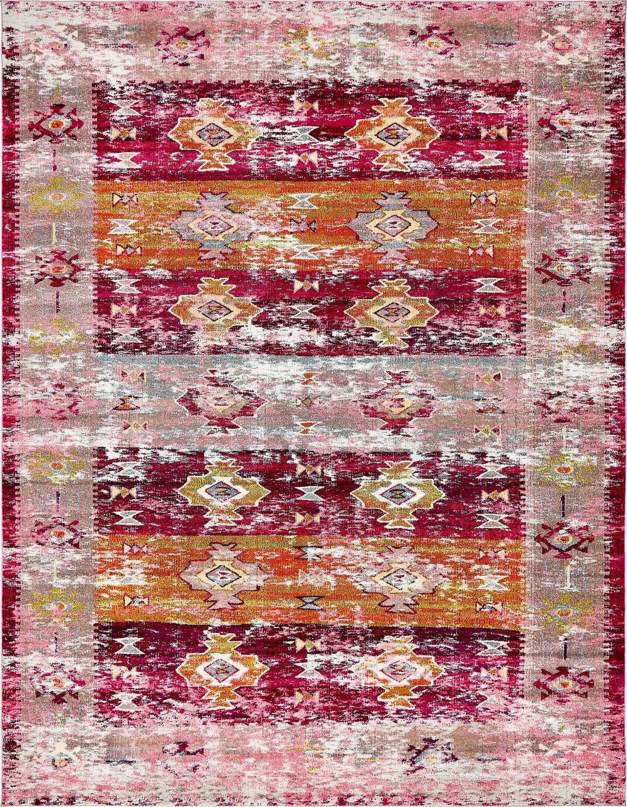 A rectangular El Paso Collection rug featuring a vibrant bohemian pattern in shades of pink, orange, and red with tribal motifs and a distressed finish.