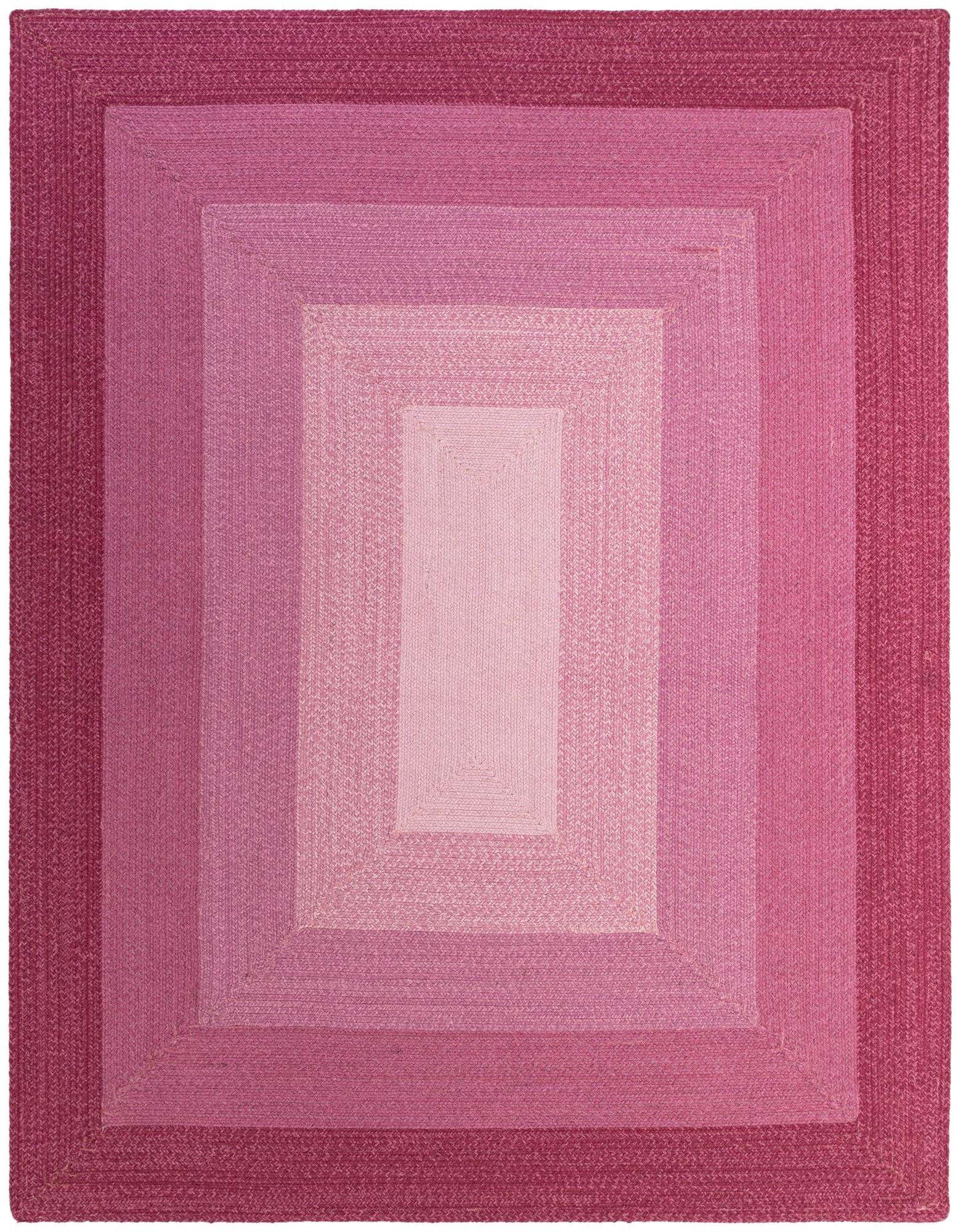 A rectangular 8x10 hand-braided wool rug featuring a modern ombre design with shades of pink, from deep fuchsia to light blush, creating a gradient effect.