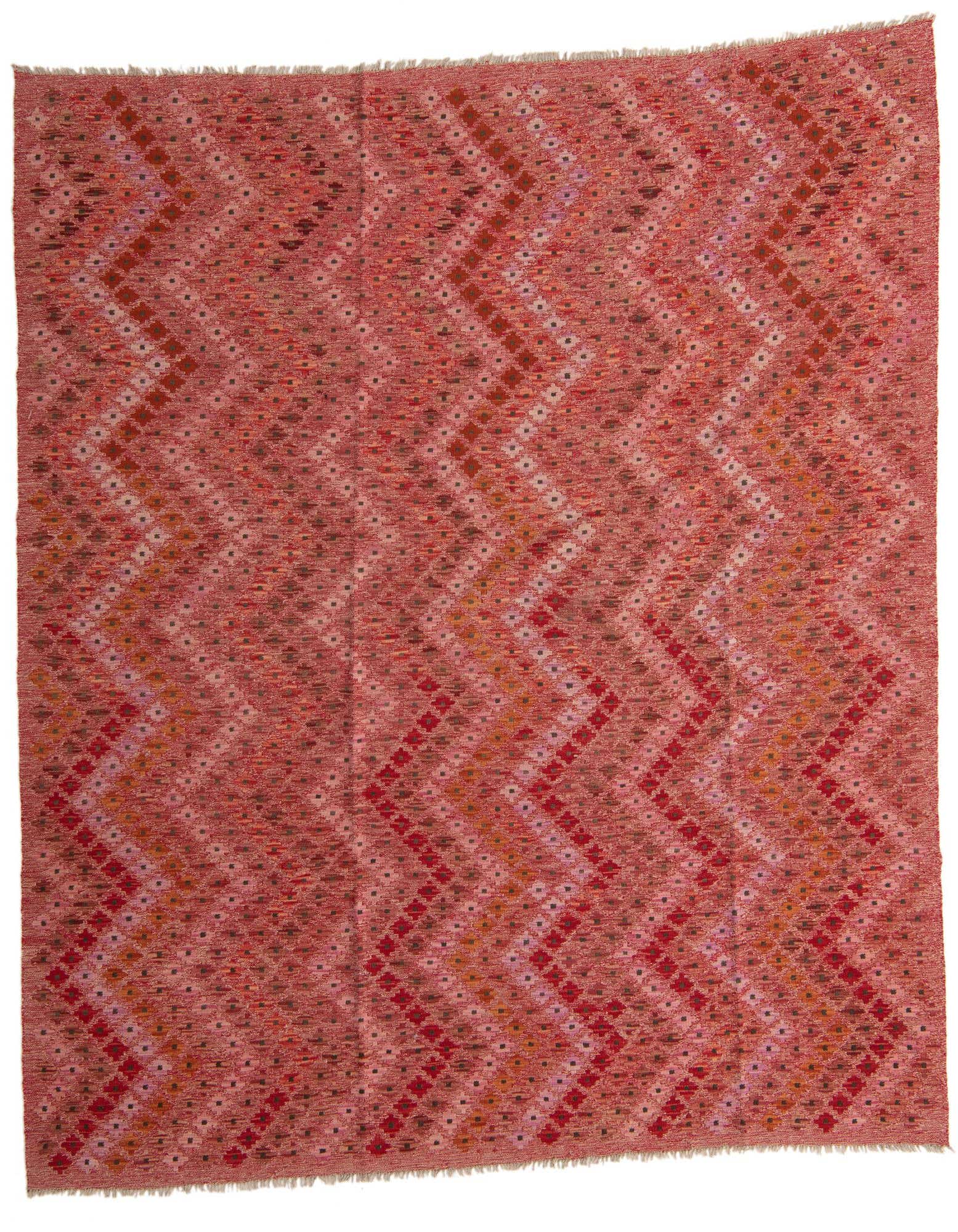 A rectangular 8x10 pink wool flatweave rug with a modern Southwestern tribal pattern of zigzags and small diamond shapes.