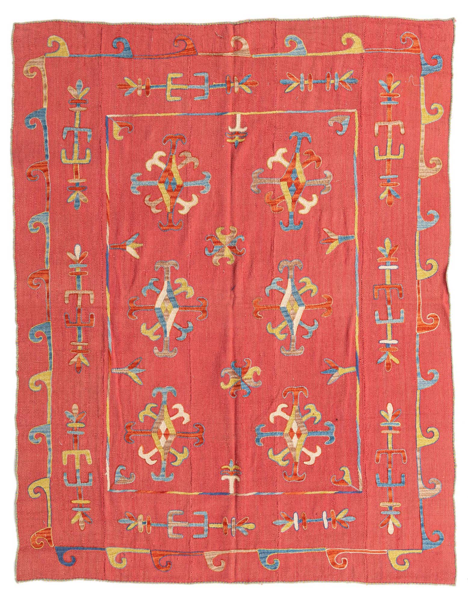 A 5x8 rectangular Kilim Suzani rug featuring a vibrant pink field with colorful tribal and abstract patterns in blue, yellow, and white.