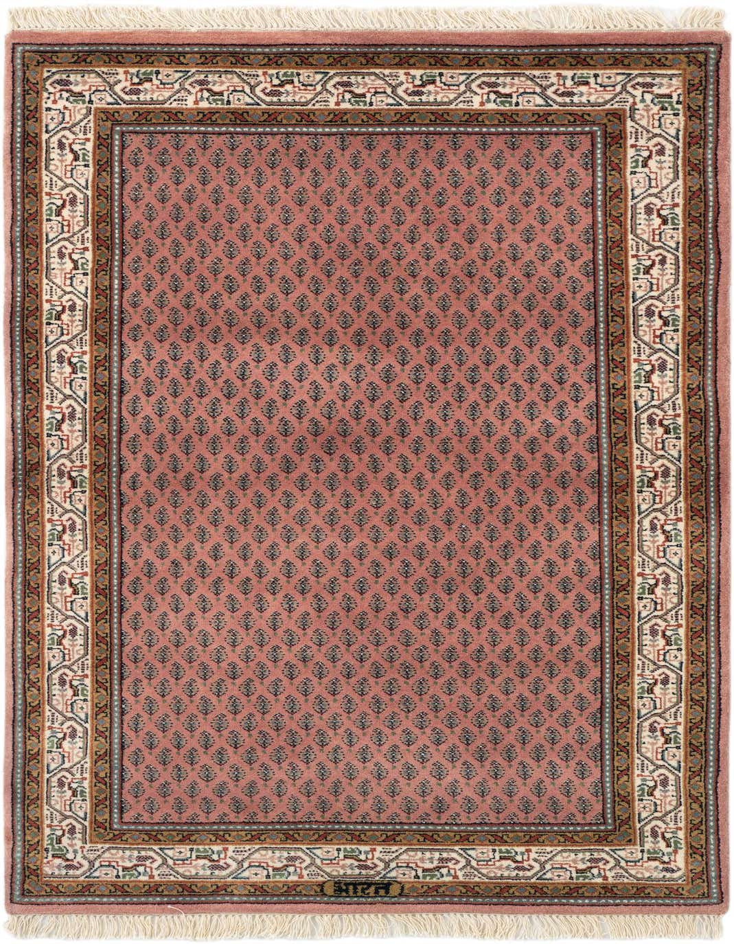 A 3x5 rectangular Mir wool rug in pink, featuring a traditional Oriental pattern with intricate borders and a repeating floral motif.