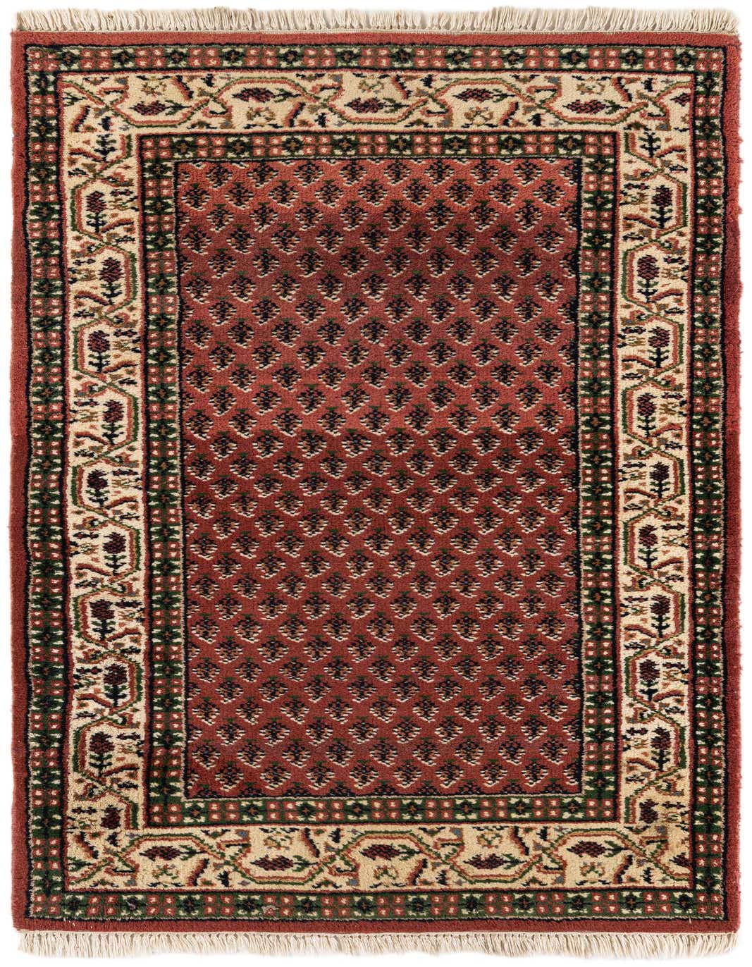 A 3x5 rectangular Mir rug in pink, featuring a traditional border pattern with floral motifs and fringe.