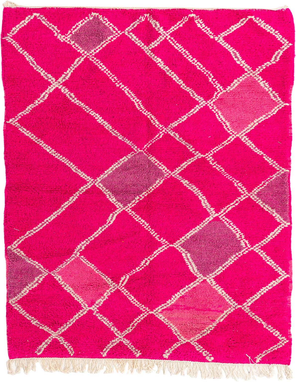 A vibrant 5x8 rectangular pink shag rug with a white tribal diamond pattern and subtle pink color variations, featuring fringe.
