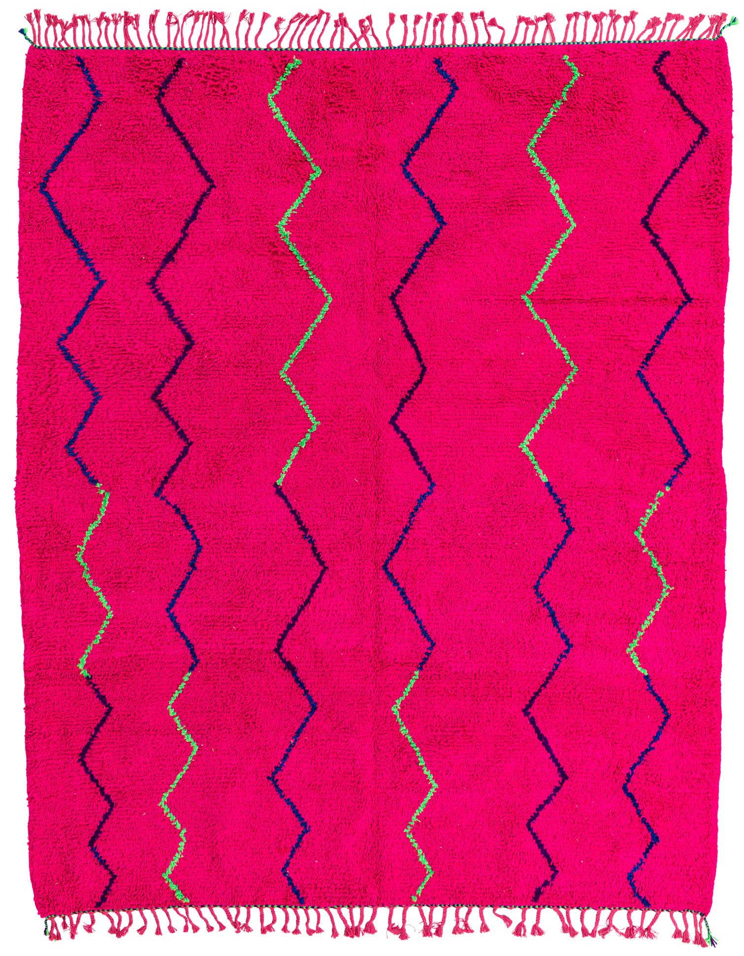 A vibrant 7x10 rectangular pink shag rug with alternating vertical zigzag patterns in bright green and deep blue.