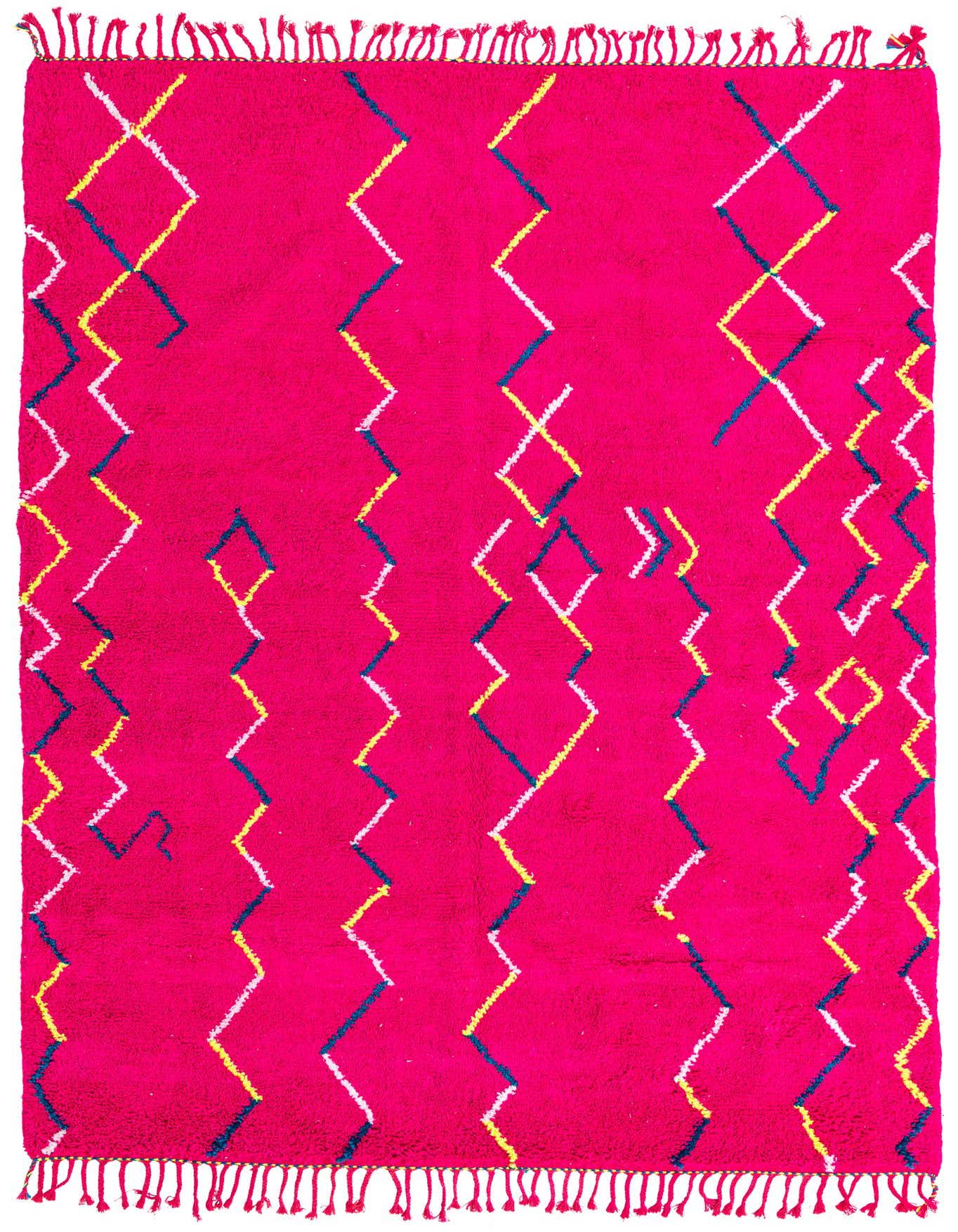A vibrant 7x10 rectangular shag rug in fuchsia pink with a modern tribal pattern of white, yellow, and blue zigzags and diamonds.