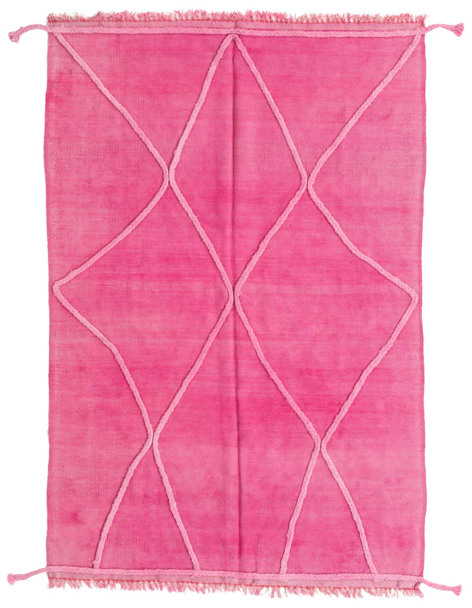 A 4x6 rectangular pink shag rug with a raised geometric diamond pattern and fringed edges.