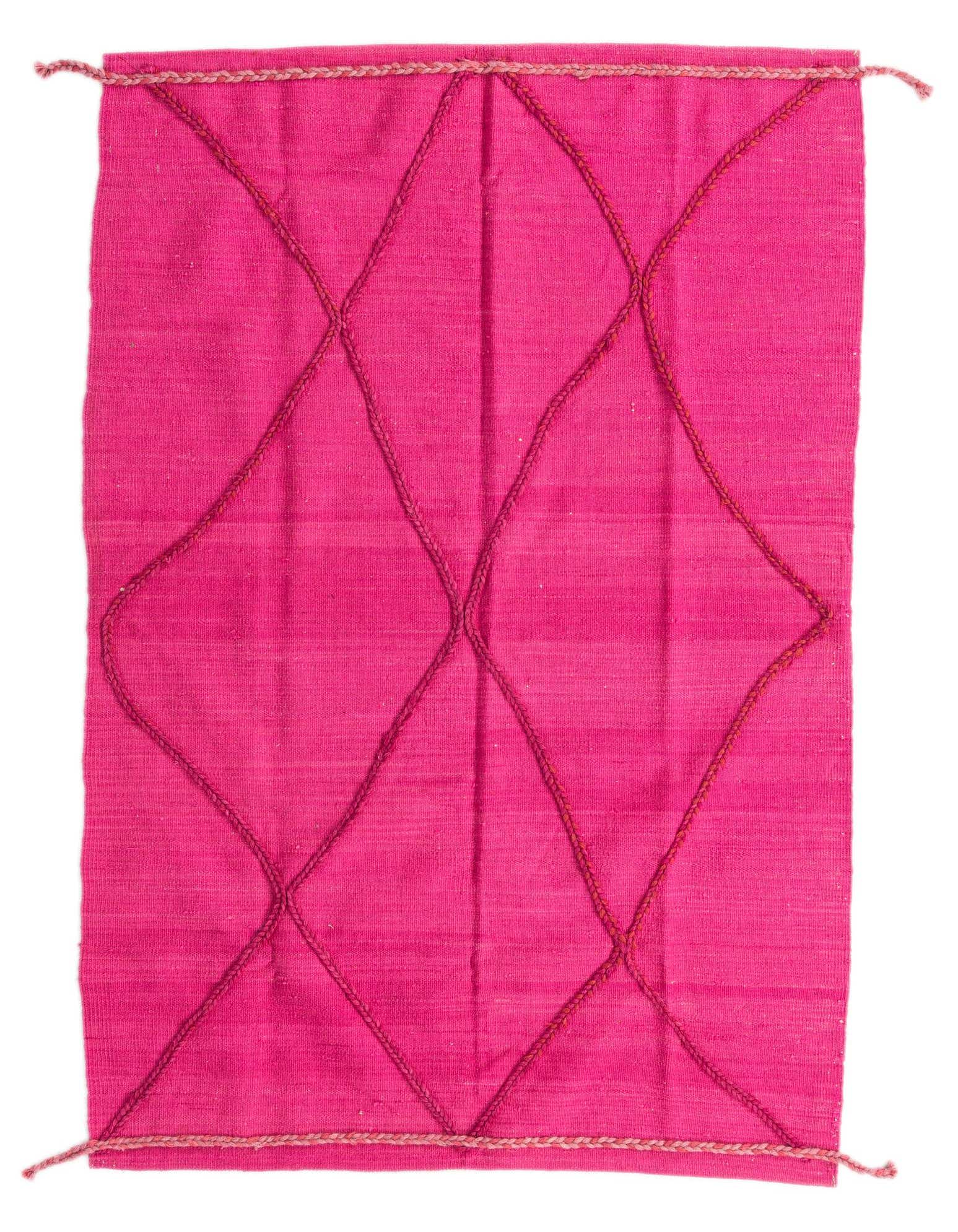 A 4x6 rectangular hot pink wool shag rug with a dark pink tribal diamond pattern, handmade.