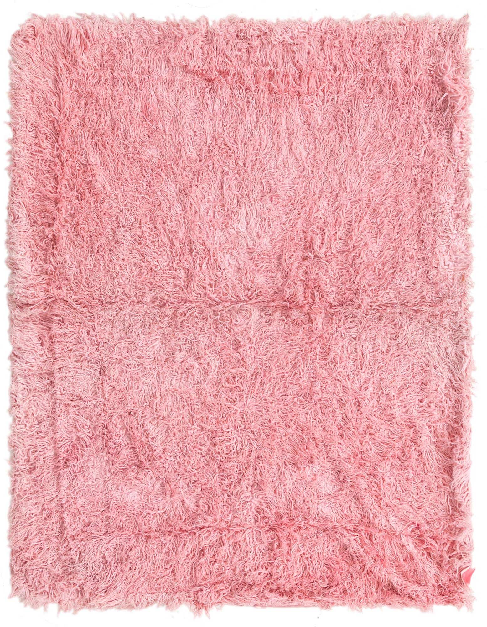 A soft, rectangular 4x6 pink shag rug with a plush, textured wool pile, perfect for a cozy living room or bedroom.