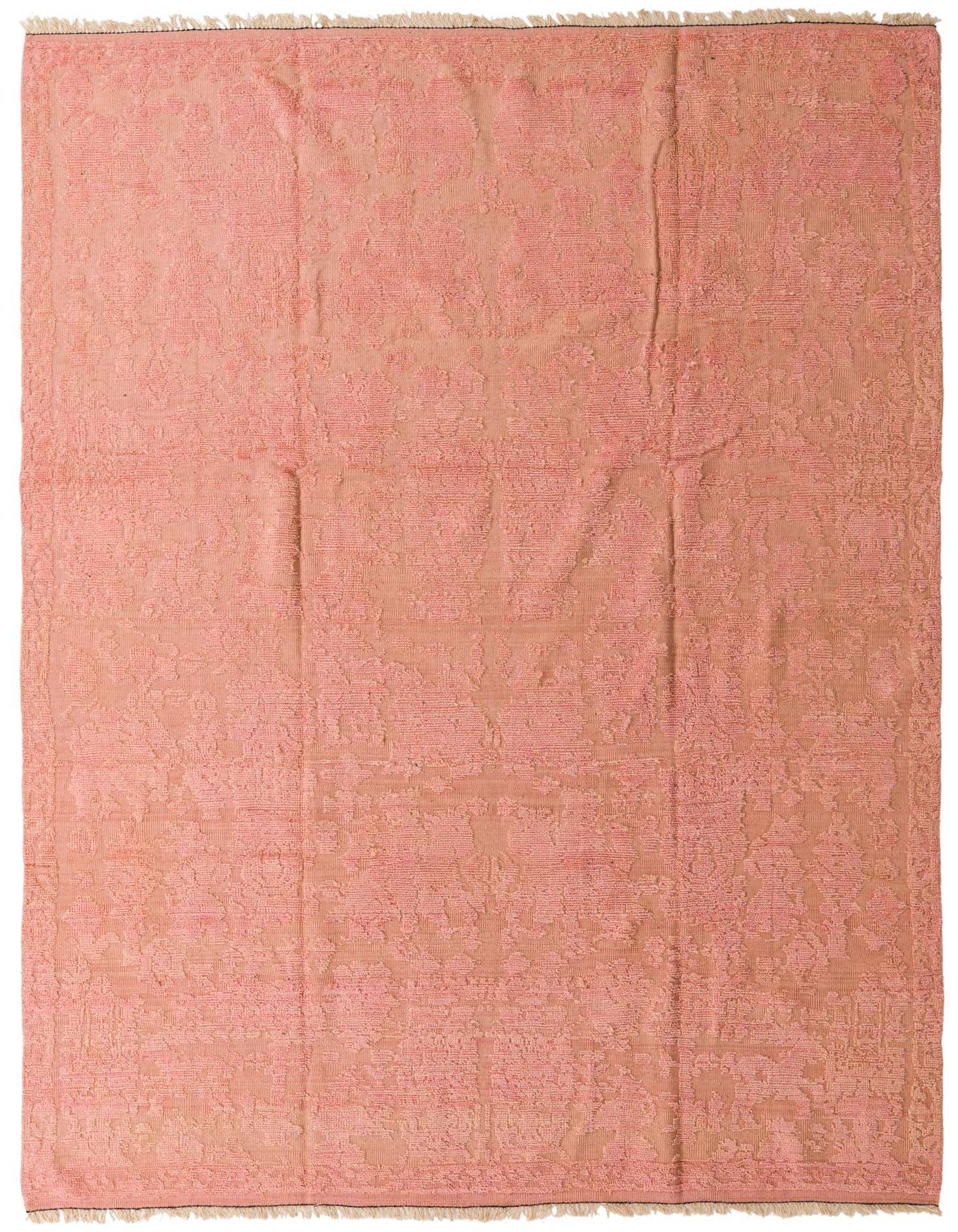 A 9x12 rectangular Oushak rug in varying shades of pink, featuring a subtle, abstract pattern and fringed edges.