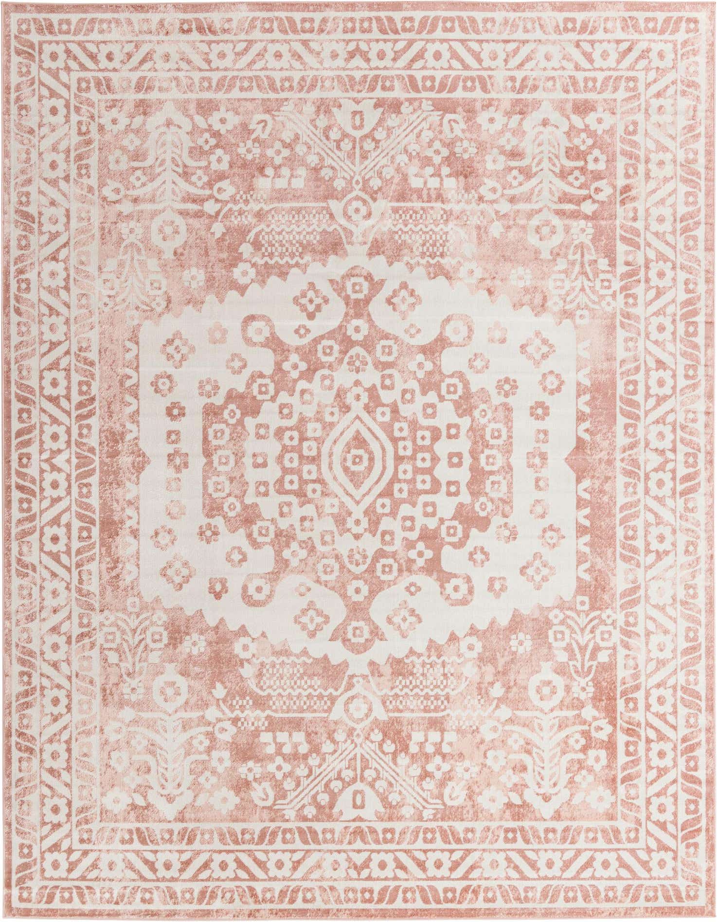 A 10x13 rectangular pink and white Bohemian rug with a faded traditional medallion pattern.