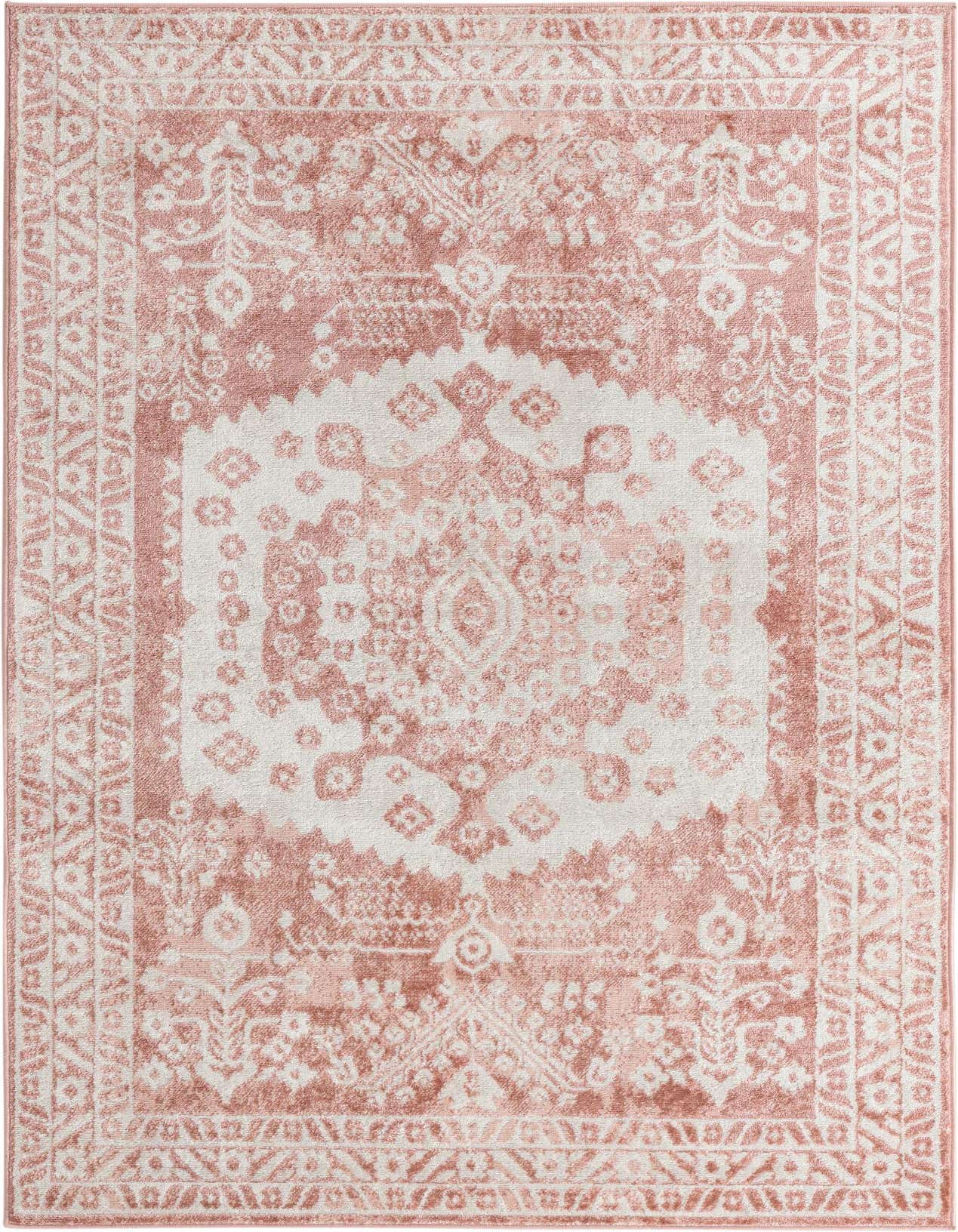 A 5x8 rectangular pink and white bohemian area rug with a vintage medallion and botanical pattern, suitable for a living room.