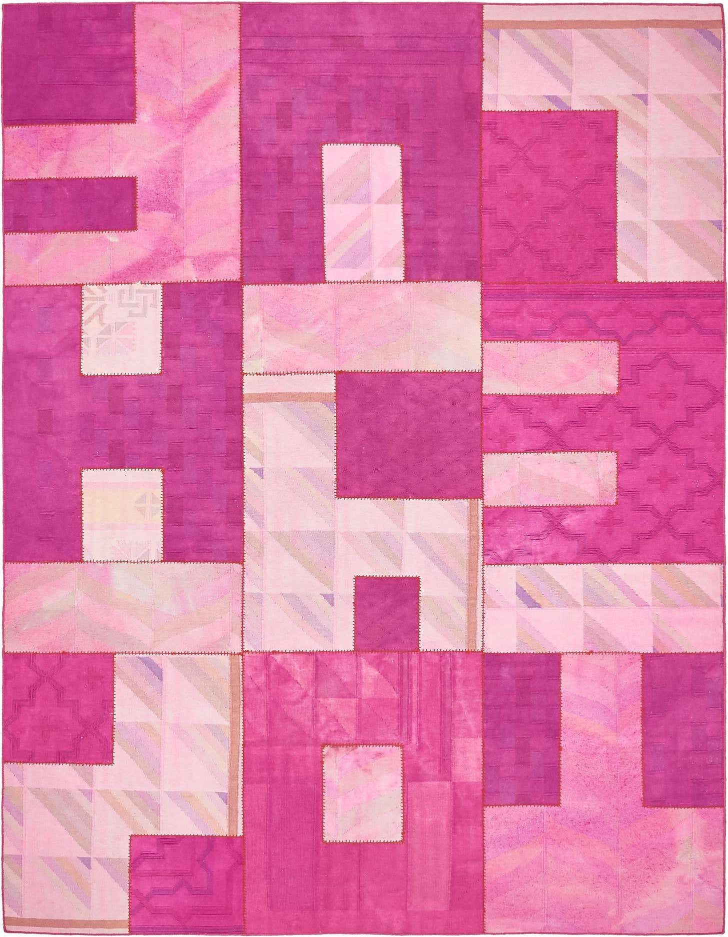 A 7x10 rectangular patchwork rug featuring various shades of pink in a modern, abstract design.