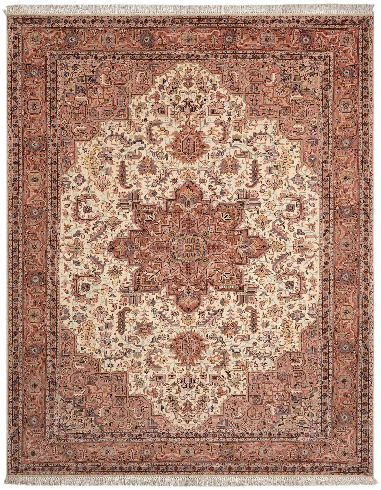 A 6x9 rectangular handmade Persian rug with a central medallion and intricate floral patterns in shades of pink, cream, and subtle blues.