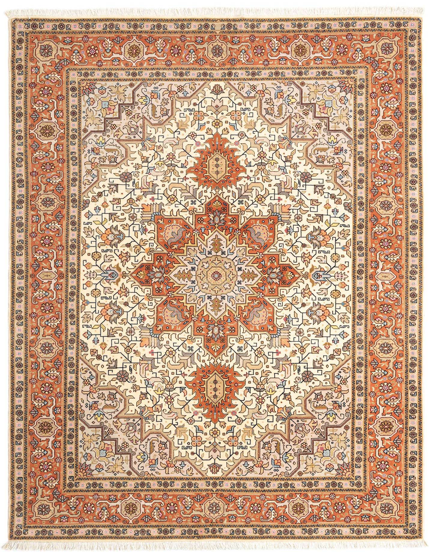 A 4x6 rectangular Persian Tabriz area rug in pinks, creams, and oranges with an intricate floral medallion design.