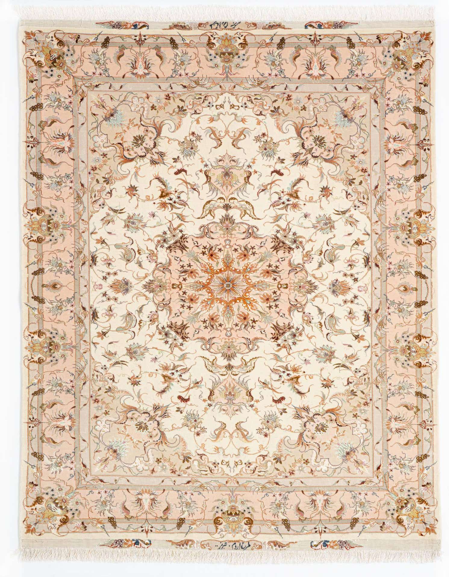 A 5x8 rectangular Tabriz Persian rug featuring an intricate floral medallion pattern in shades of pink, cream, and gold.