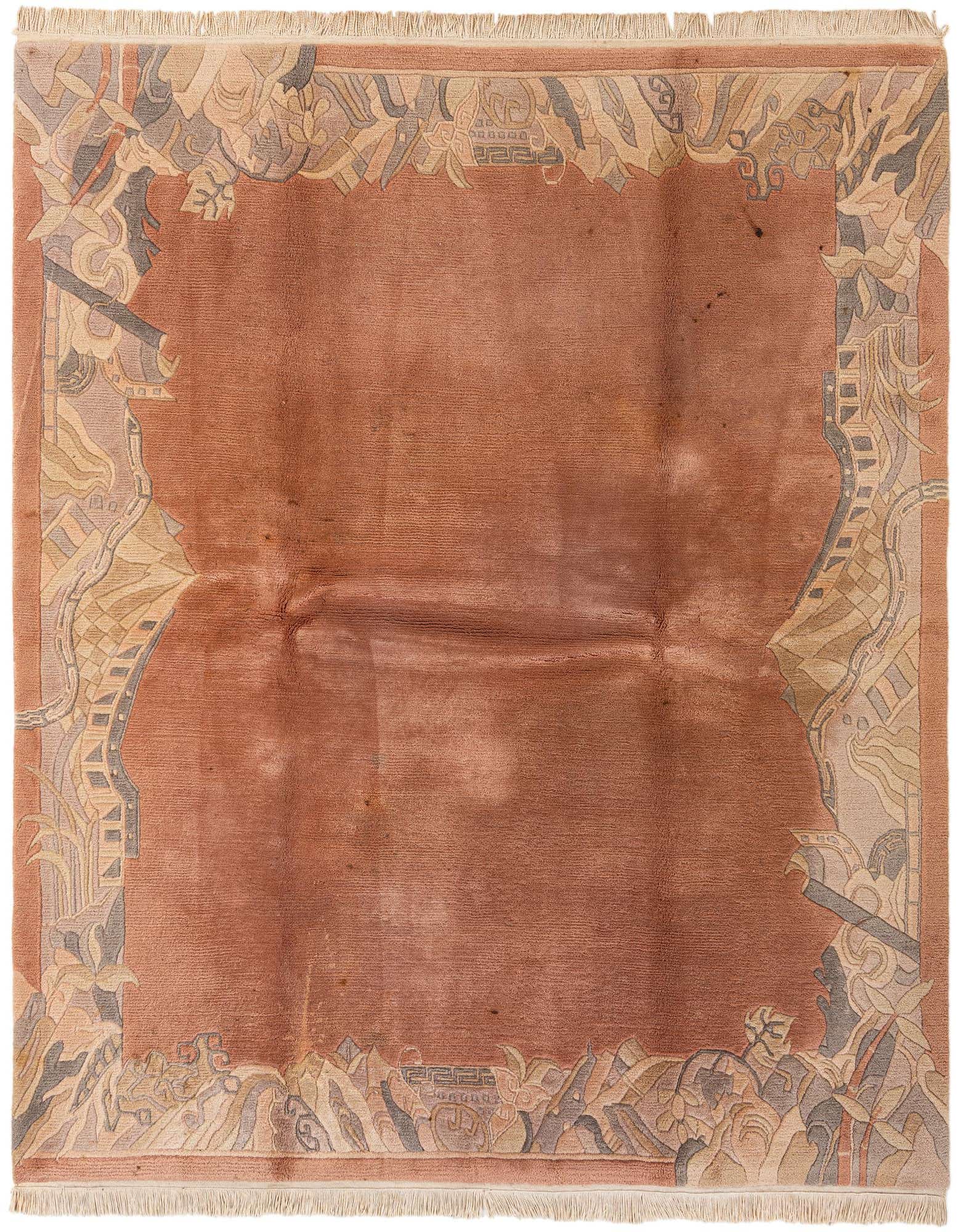 A 6x9 rectangular pink wool rug with an abstract, modern oriental border in muted tones of grey, beige, and light pink.