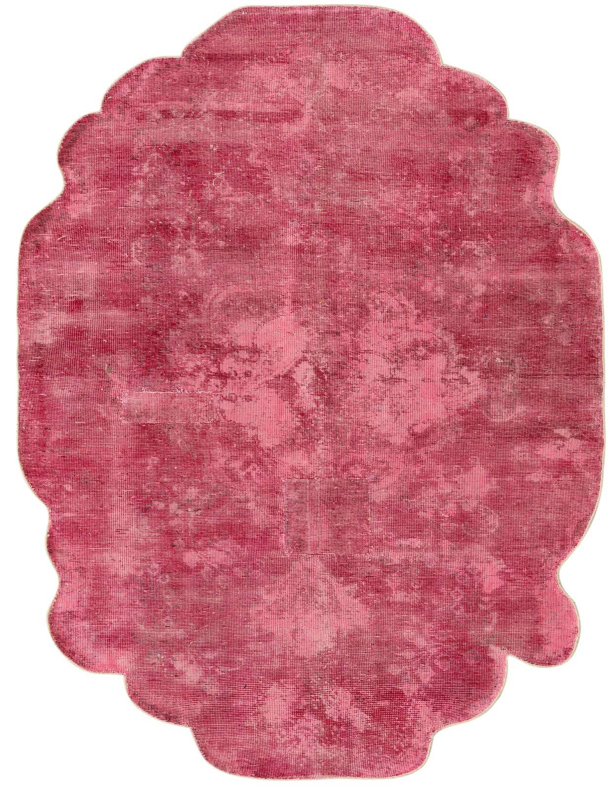 A 5x8 rectangular Ultra Vintage rug in varied pinks, featuring a distressed Persian medallion pattern and a unique scalloped edge.