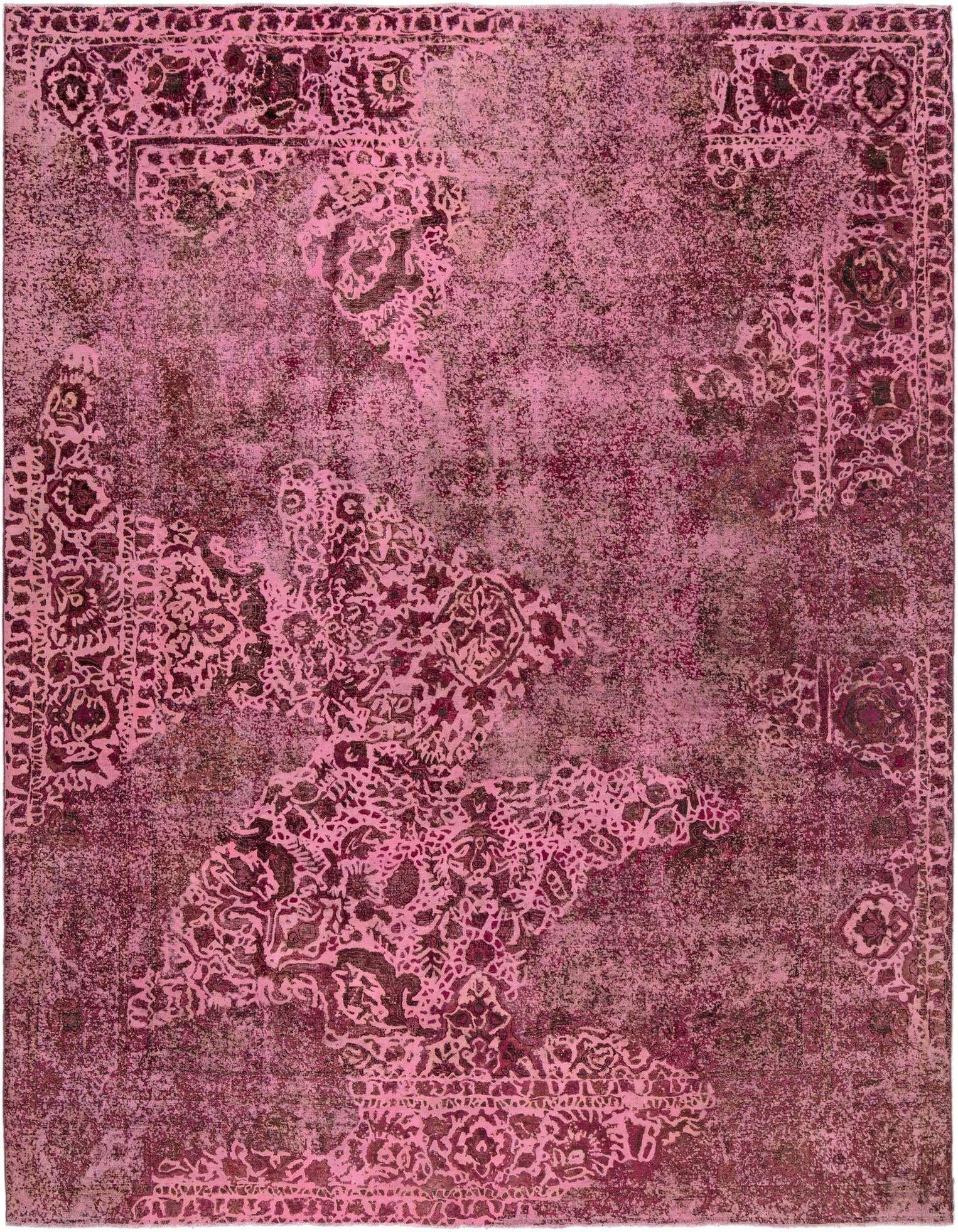 A 10x13 rectangular pink Persian wool rug with a distressed vintage pattern, ideal for a living room.